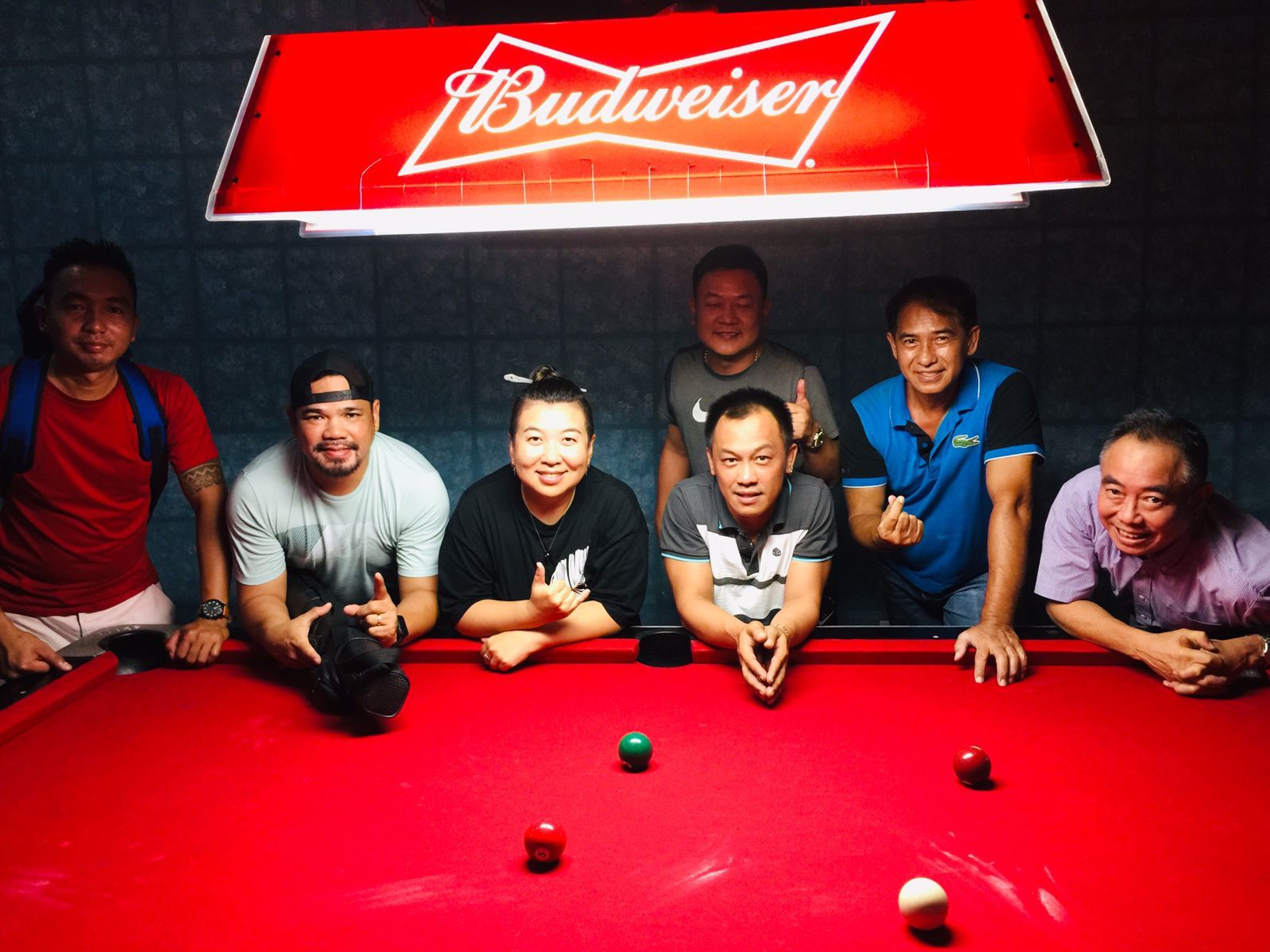 The Ideal Signs JC Rustlers pose for a photo after defeating the 9 Eleven Rebels in a Tuesday Division semifinal match of the SBA Budweiser Open 8-Ball League on Tuesday at Just Chillin’ Bar.