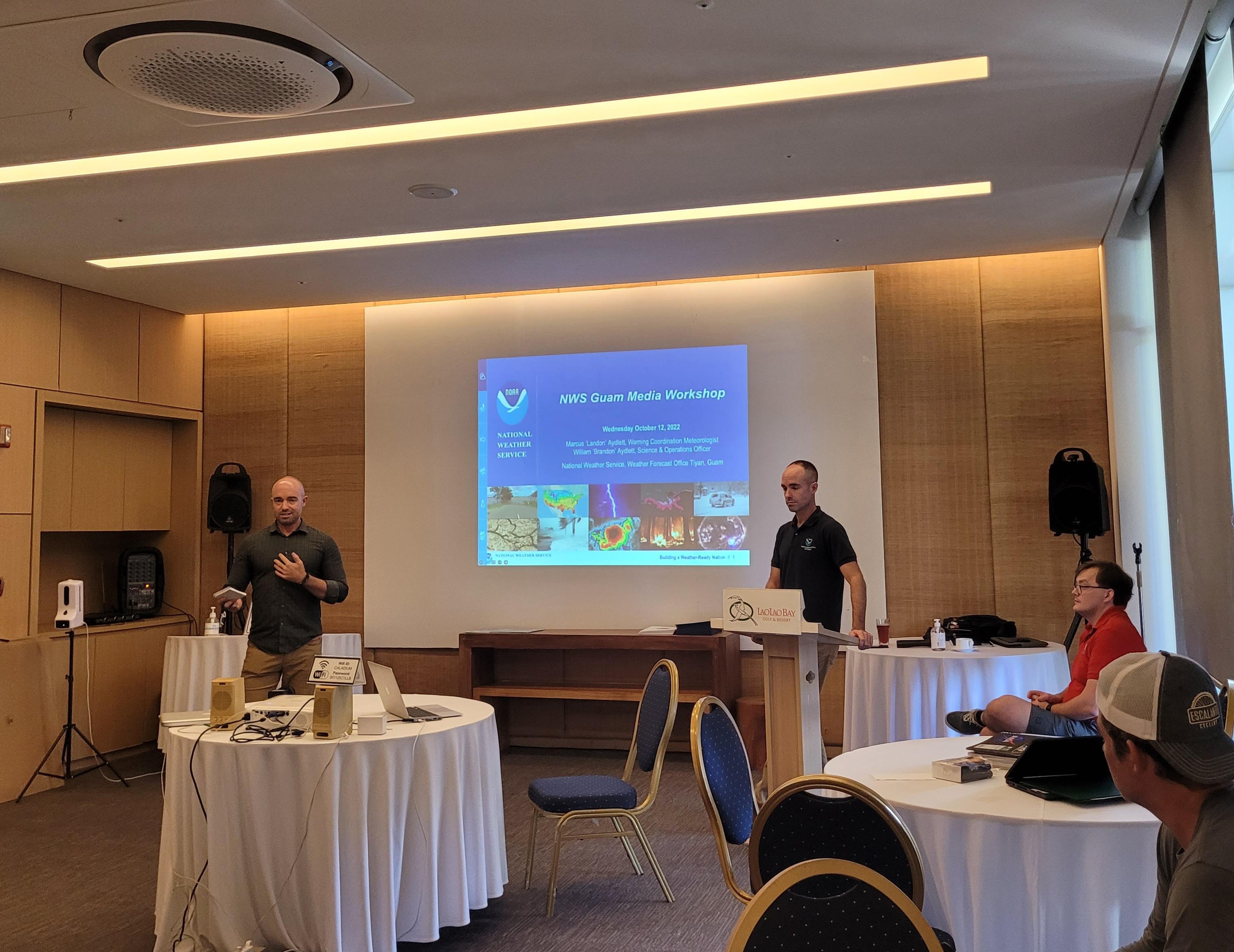 National Weather Station-Guam warning coordination meteorologist Landon Aydlett and his twin, Brandon Aydlett, NWS-Guam science and operations officer, conduct a media workshop at LaoLao Bay Golf & Resort Wednesday afternoon.