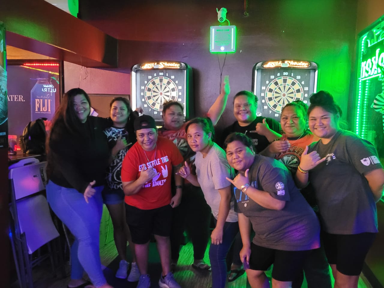 Last Shot Darty Secret and 9 Eleven Chickazz Bull-It pose for a photo during their match in the ladies division of the SEDA Bud Light Dart League at Last Shot Bar.
