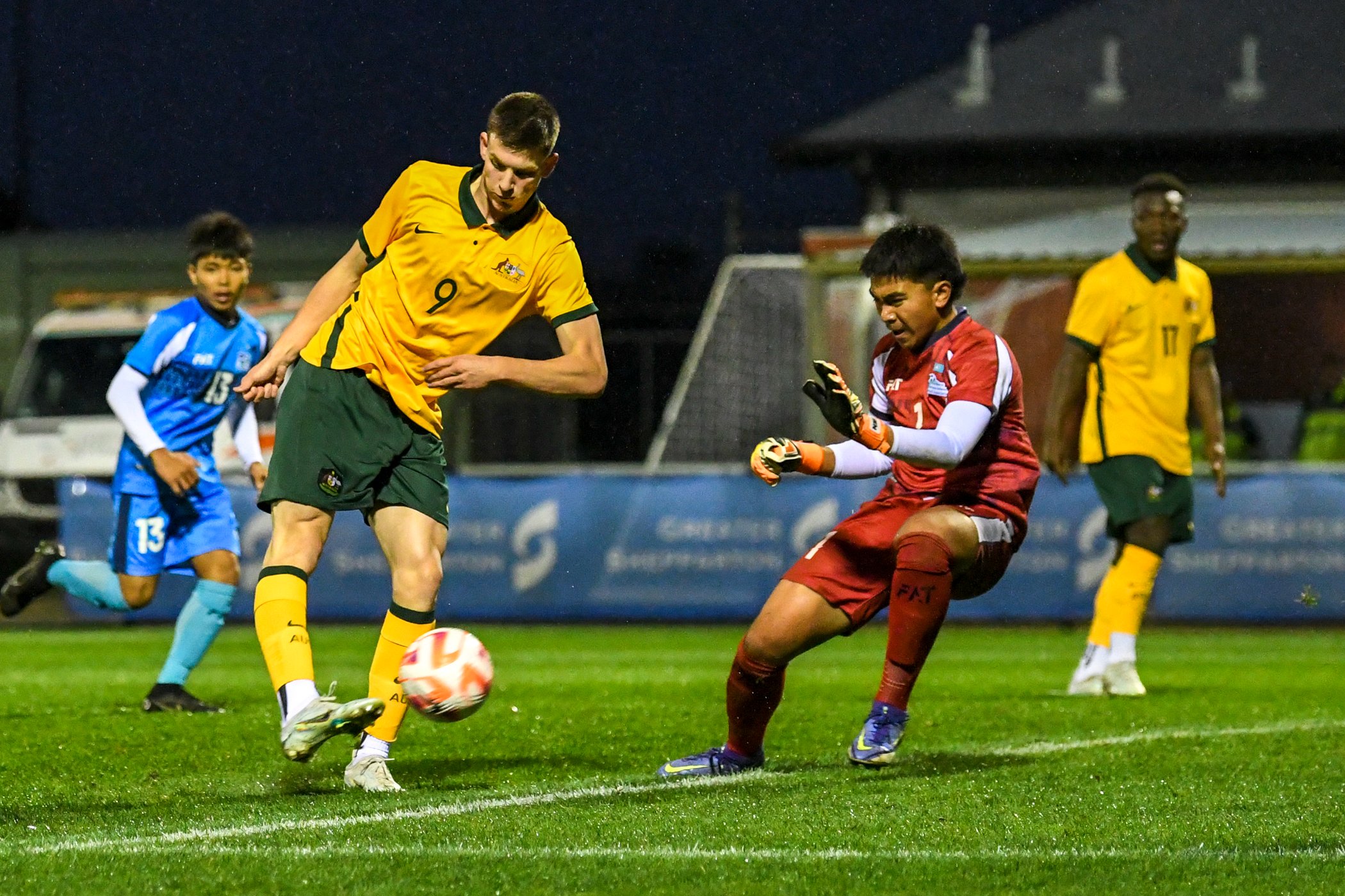 NMI goalie Vicente Reyes, third left, steps in to deflect a shot taken by Australian pro player Max Christopher Hately during their game in the AFC U17 Asian Cup 2023 Qualifiers on Wednesday in Shepparton, Australia.