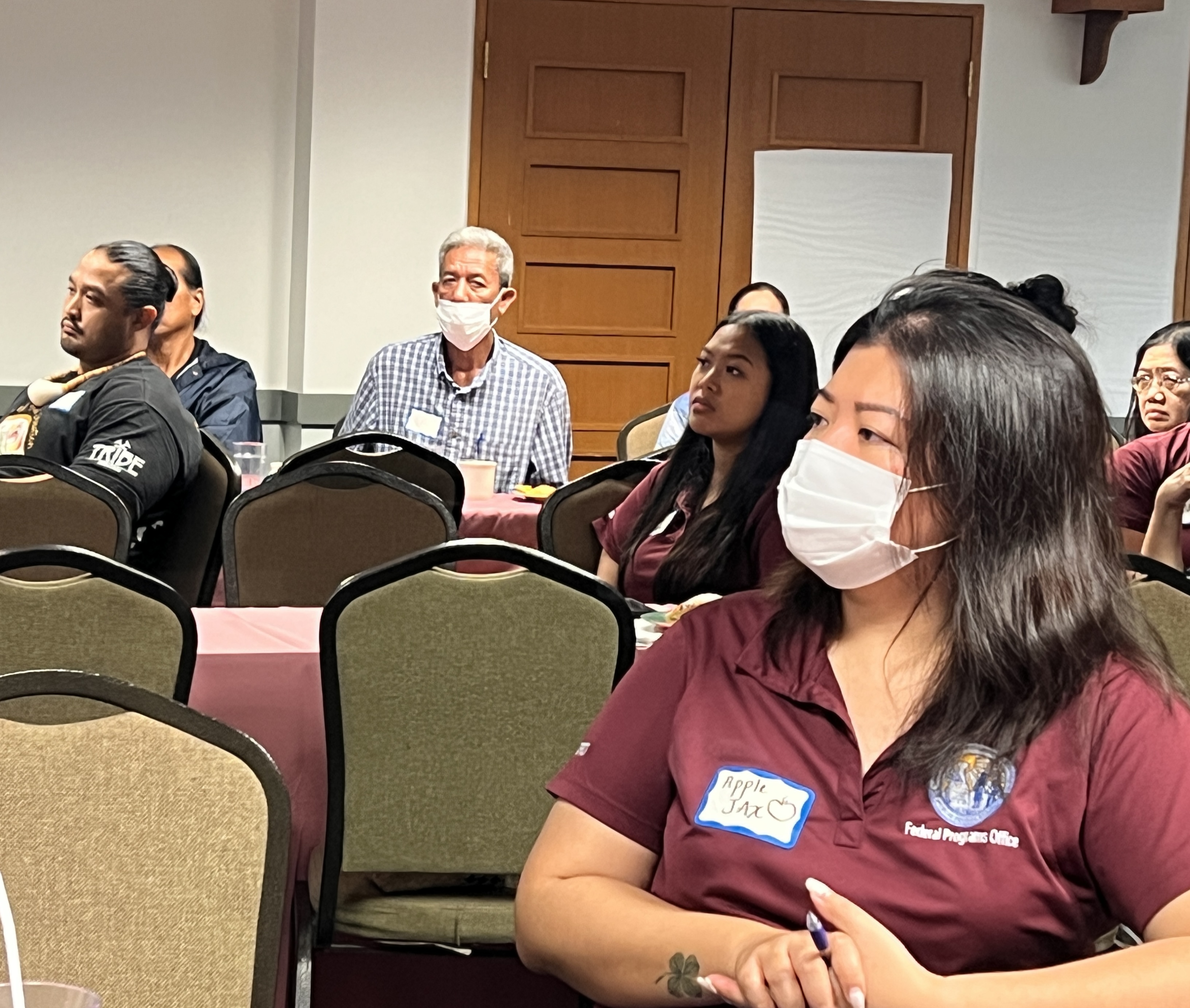 Interim Federal Programs Officer Jacqueline Che listens during the professional development session.