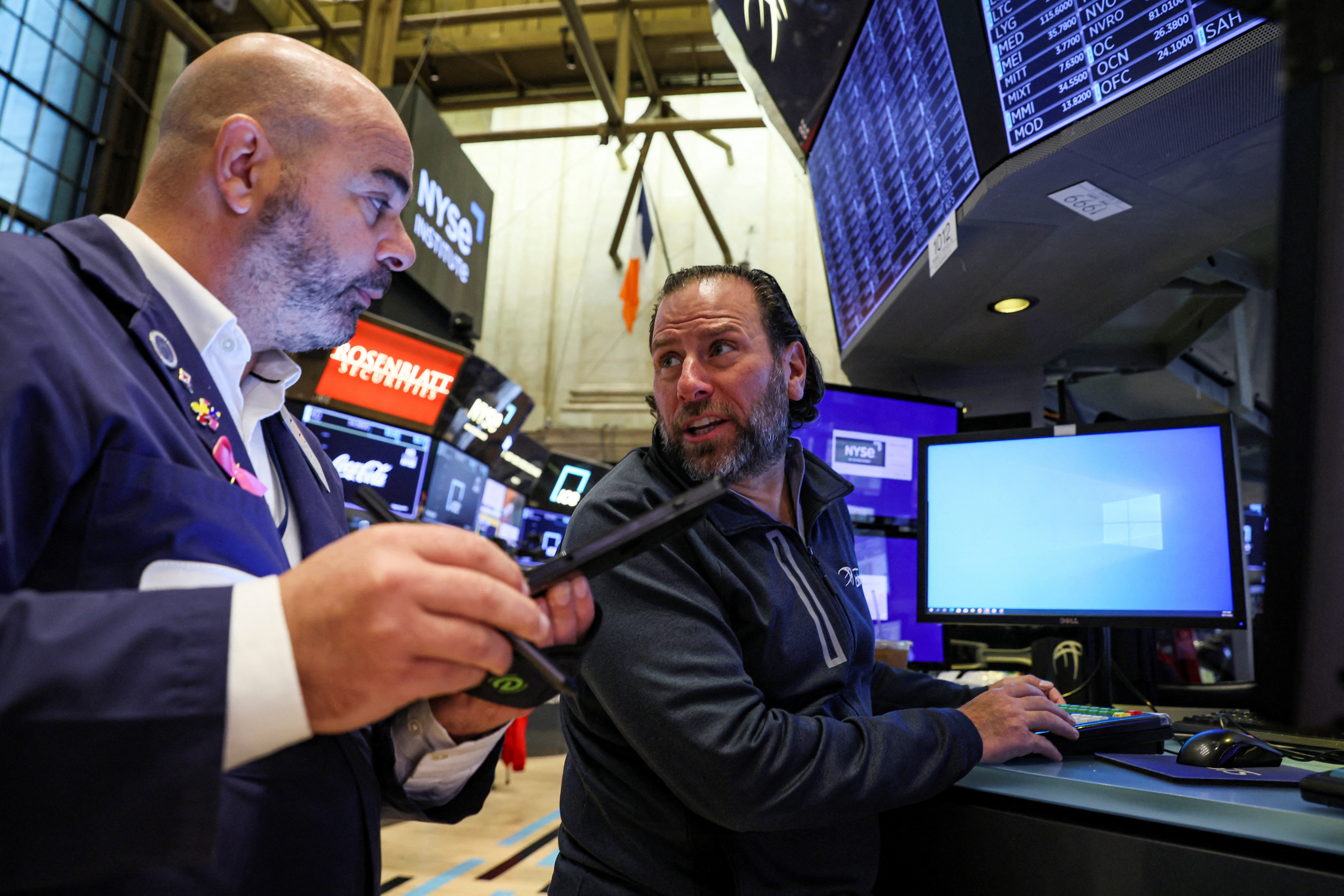 Traders work on the floor of the New York Stock Exchange in New York City, Oct. 17, 2022.
