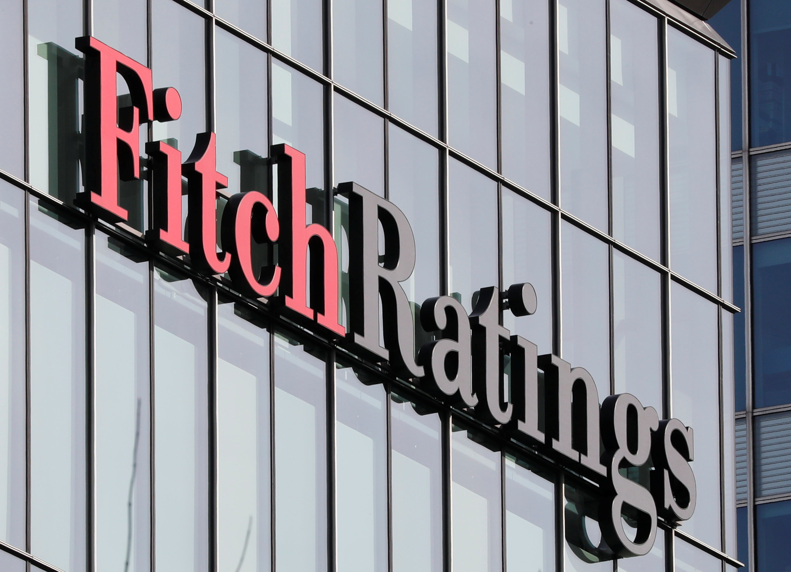 The Fitch Ratings logo is seen at their offices at Canary Wharf financial district in London, Britain, March 3, 2016.