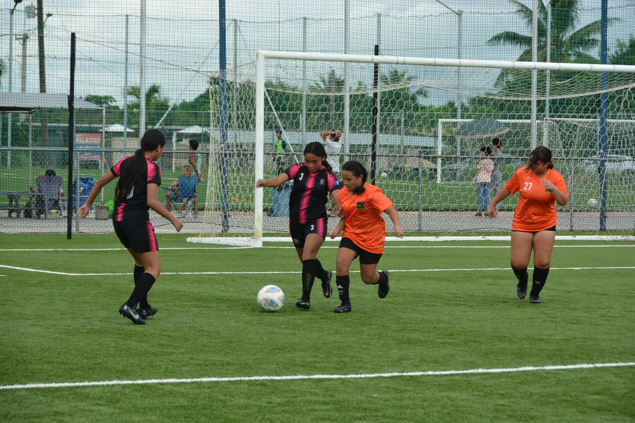 Southern United’s Selena Atalig intercepts the possession during a U16 girls division game of the 2022 TakeCare Youth Soccer League at the NMI Soccer Training Center.