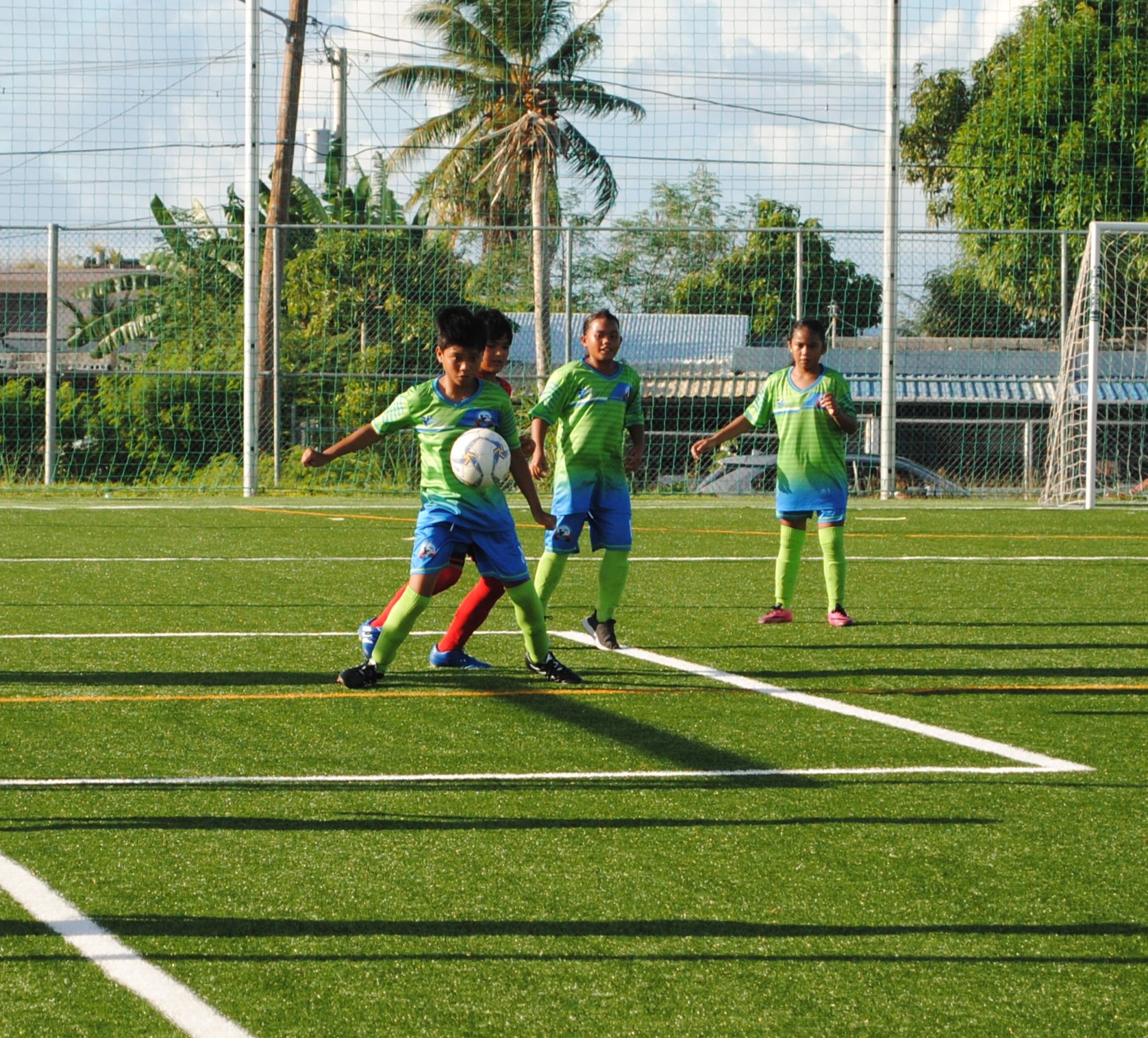 KoES 1's Javiun Sablan Jr. secures the possession during an elementary school division game of the NMIFA-PSS Interscholastic Soccer League at the NMI Soccer Training Center.