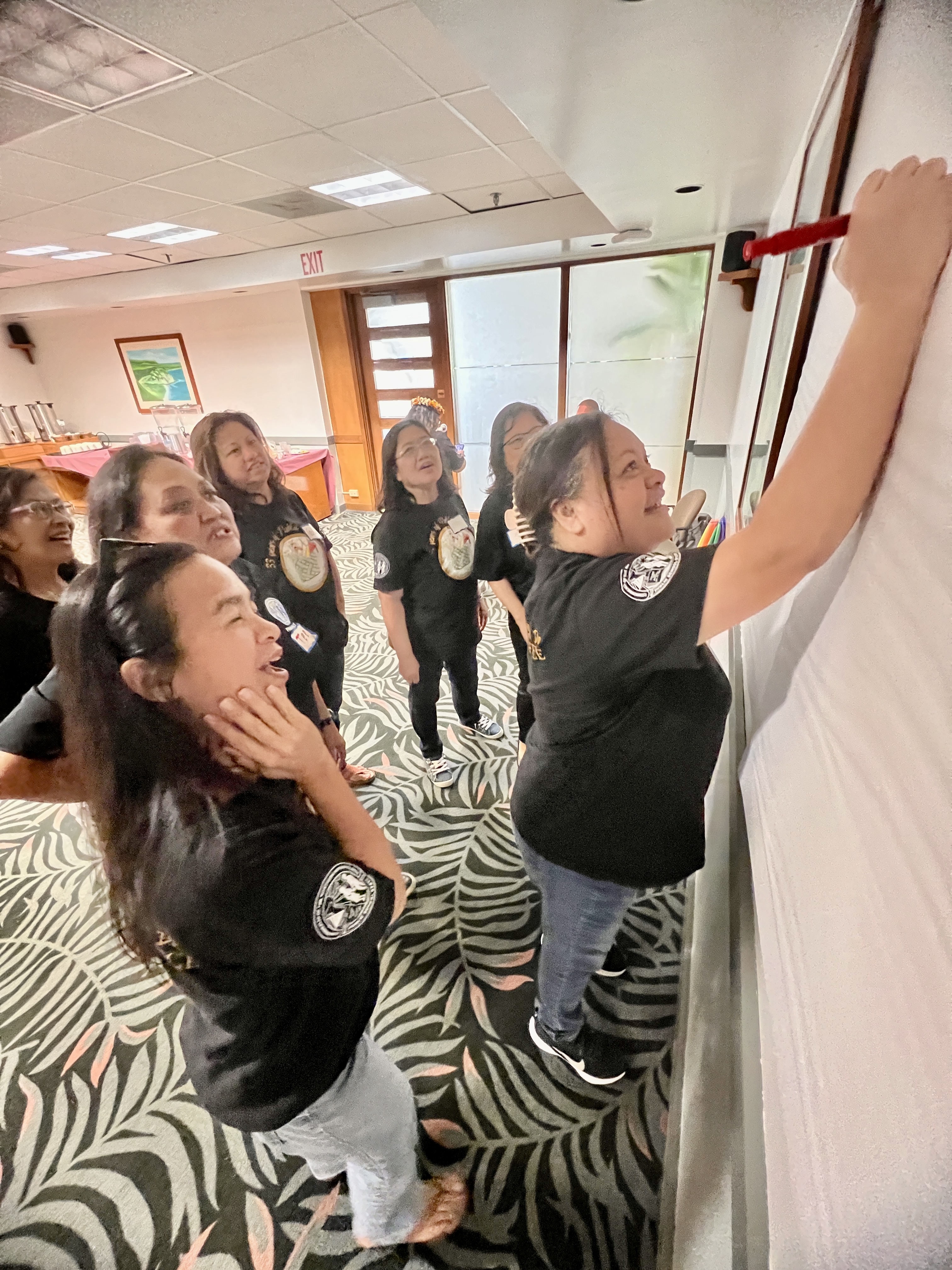 PSS Finance and Budget personnel participate in a team-building activity.