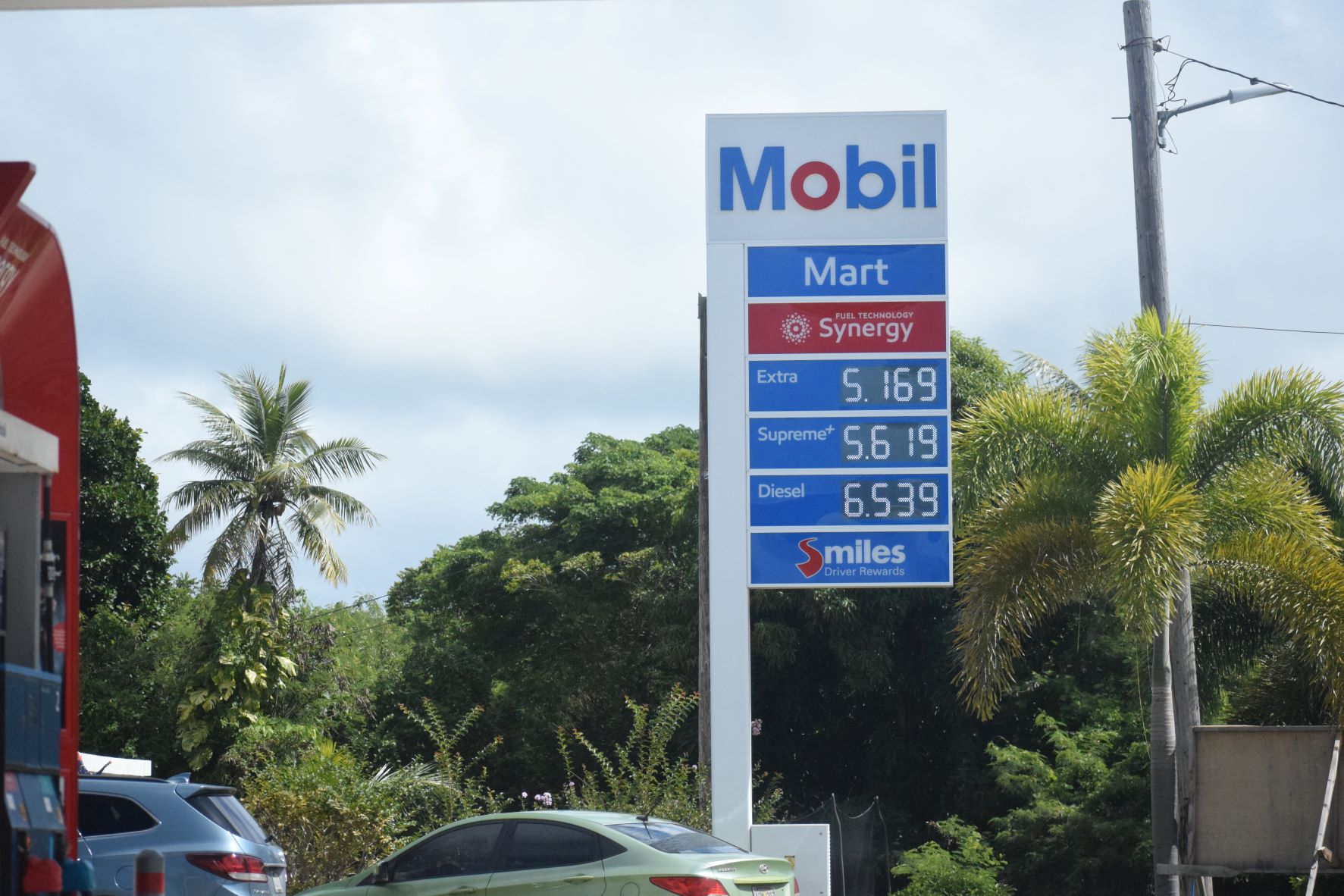 The Mobil Oil station in Tanapag displays its prices on Wednesday afternoon.