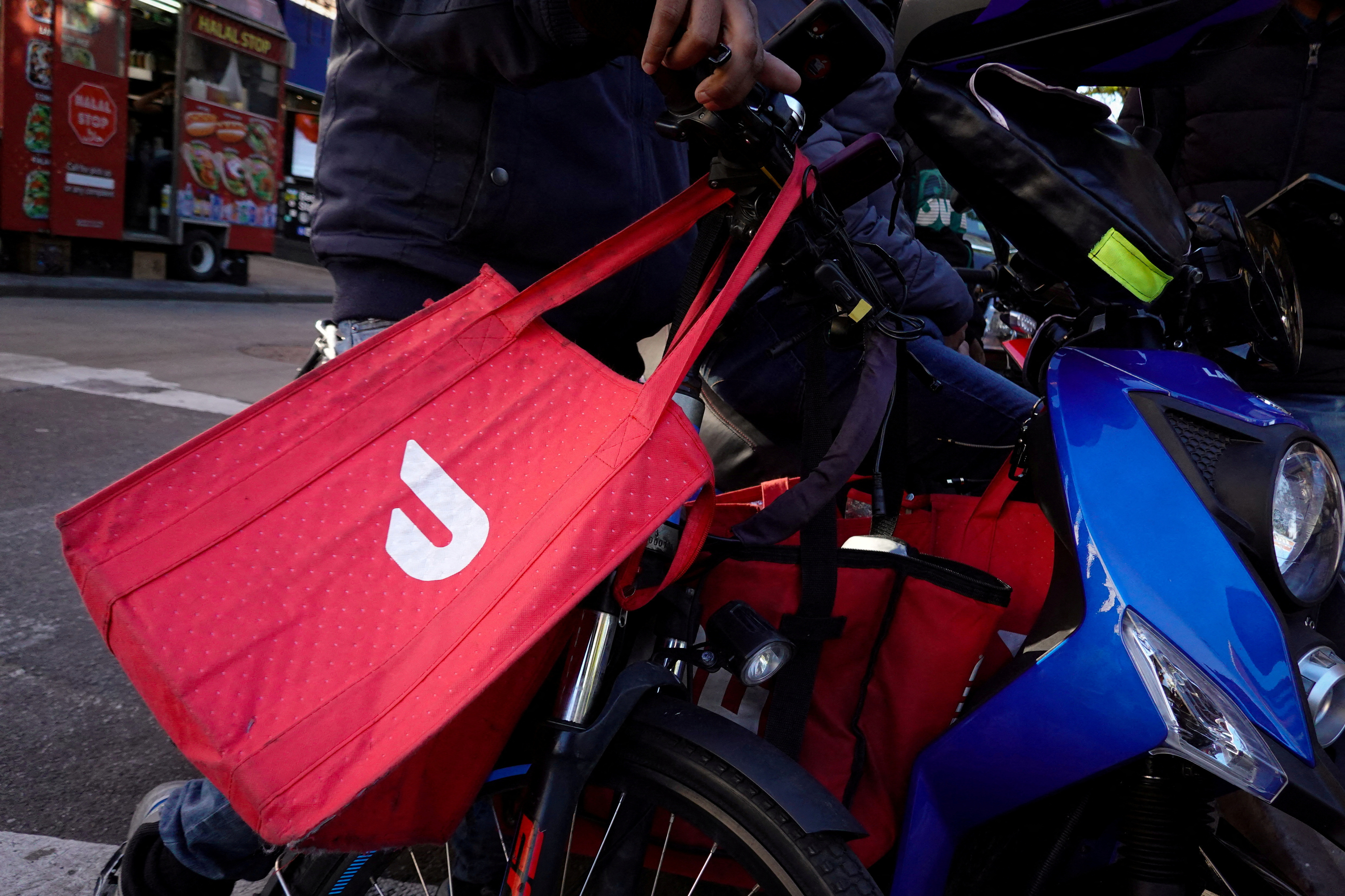 A DoorDash delivery bag is seen in Brooklyn, New York City, May 9, 2022.
