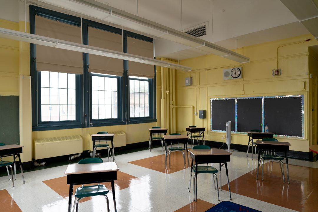 Students' desk adhere to social distancing requirements in a classroom during a news conference at New Bridges Elementary School, ahead of schools reopening, in the Brooklyn borough of New York City, amid the coronavirus disease outbreak in New York, Aug. 19, 2020.