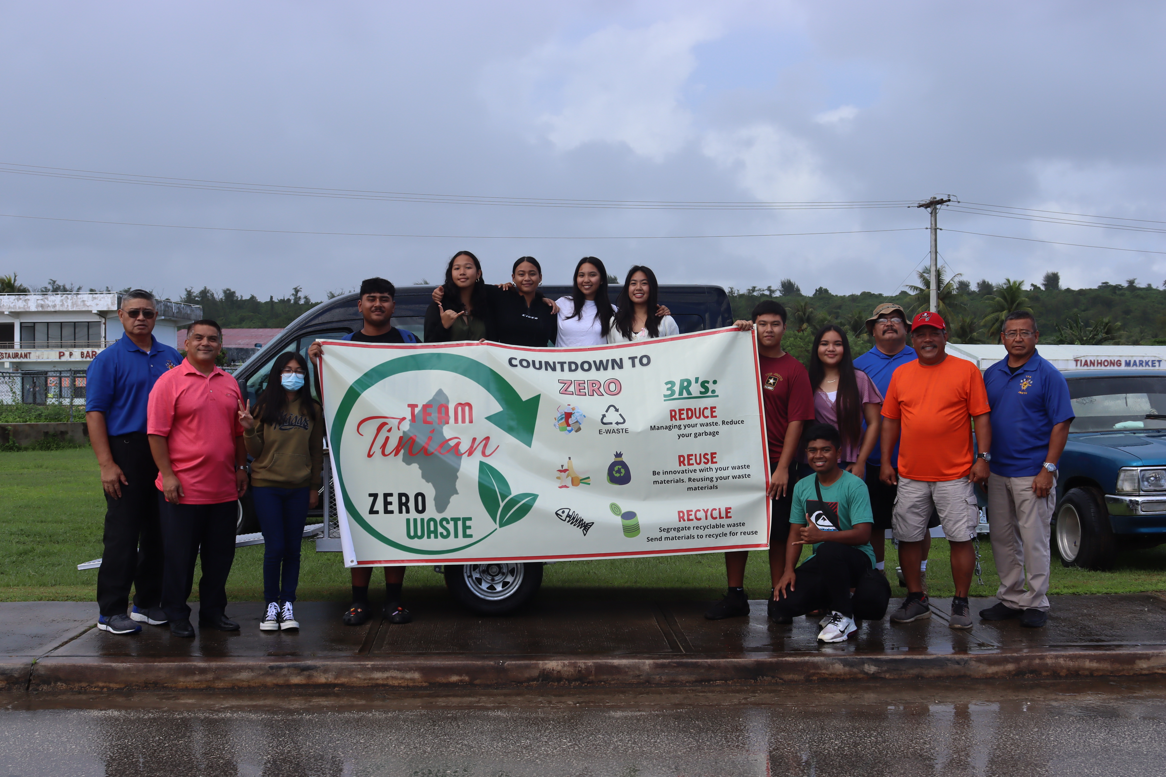 The Stallion Battalion cadets are grateful to Tinian Mayor Edwin Aldan for donating a trailer to the JROTC recycling project. Photo shows the cadets with the mayor and his staff.