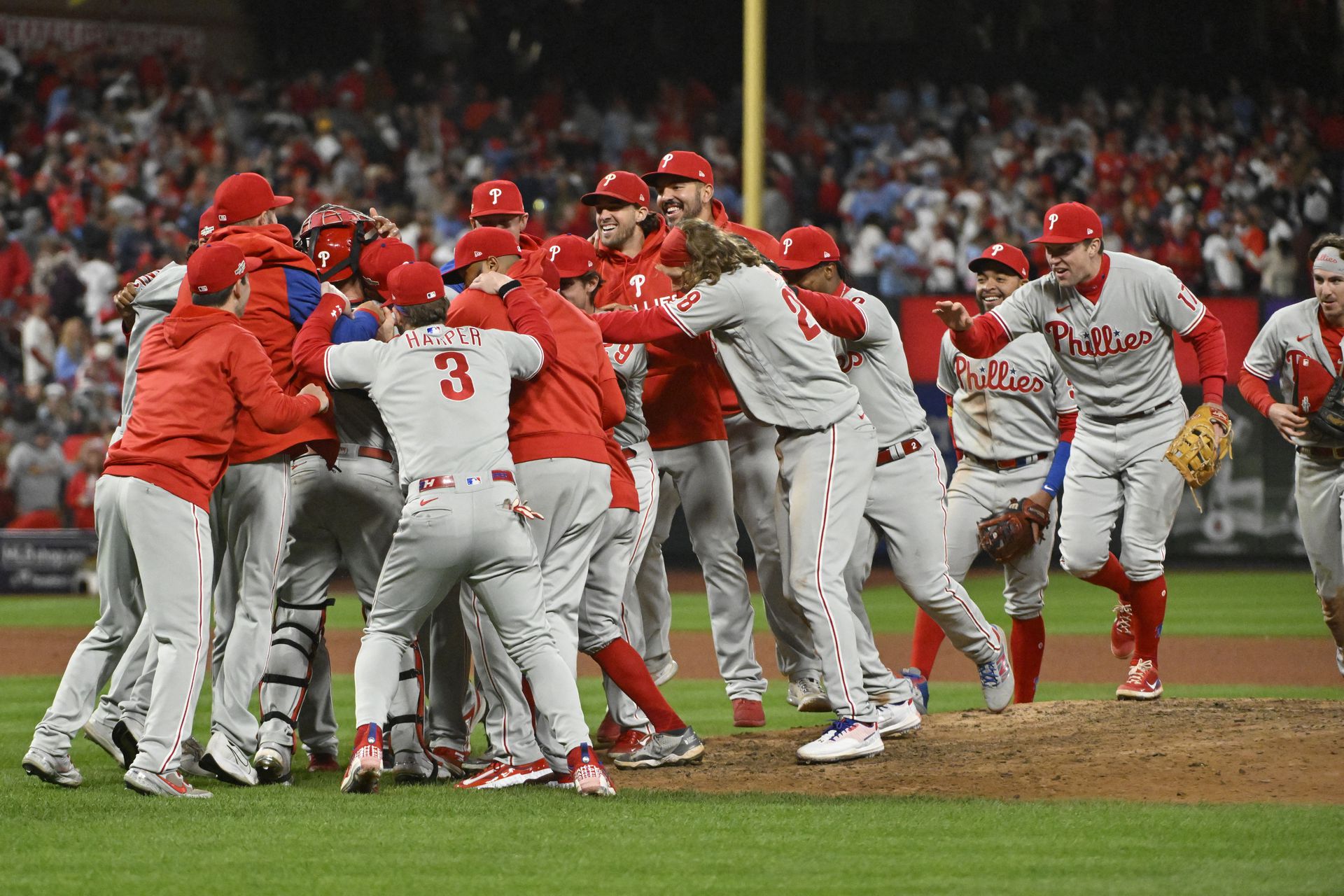 Members of the Philadelphia Phillies celebrate following their 2-0 victory against the St. Louis Cardinals in game two of the Wild Card series for the 2022 MLB Playoffs at Busch Stadium in St. Louis, Missouri, Oct 8, 2022.