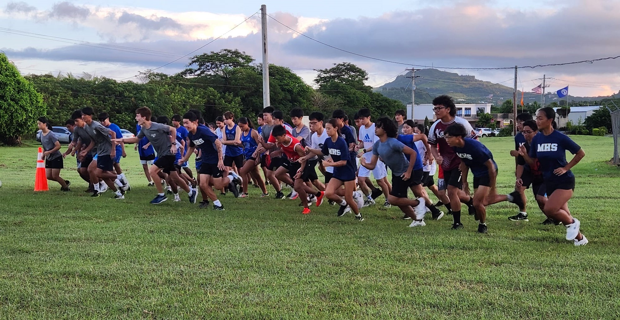 The high school division participants take off during the fourth qualifier of the NMA-PSS All School Cross Country series Saturday at the Airport Field.
