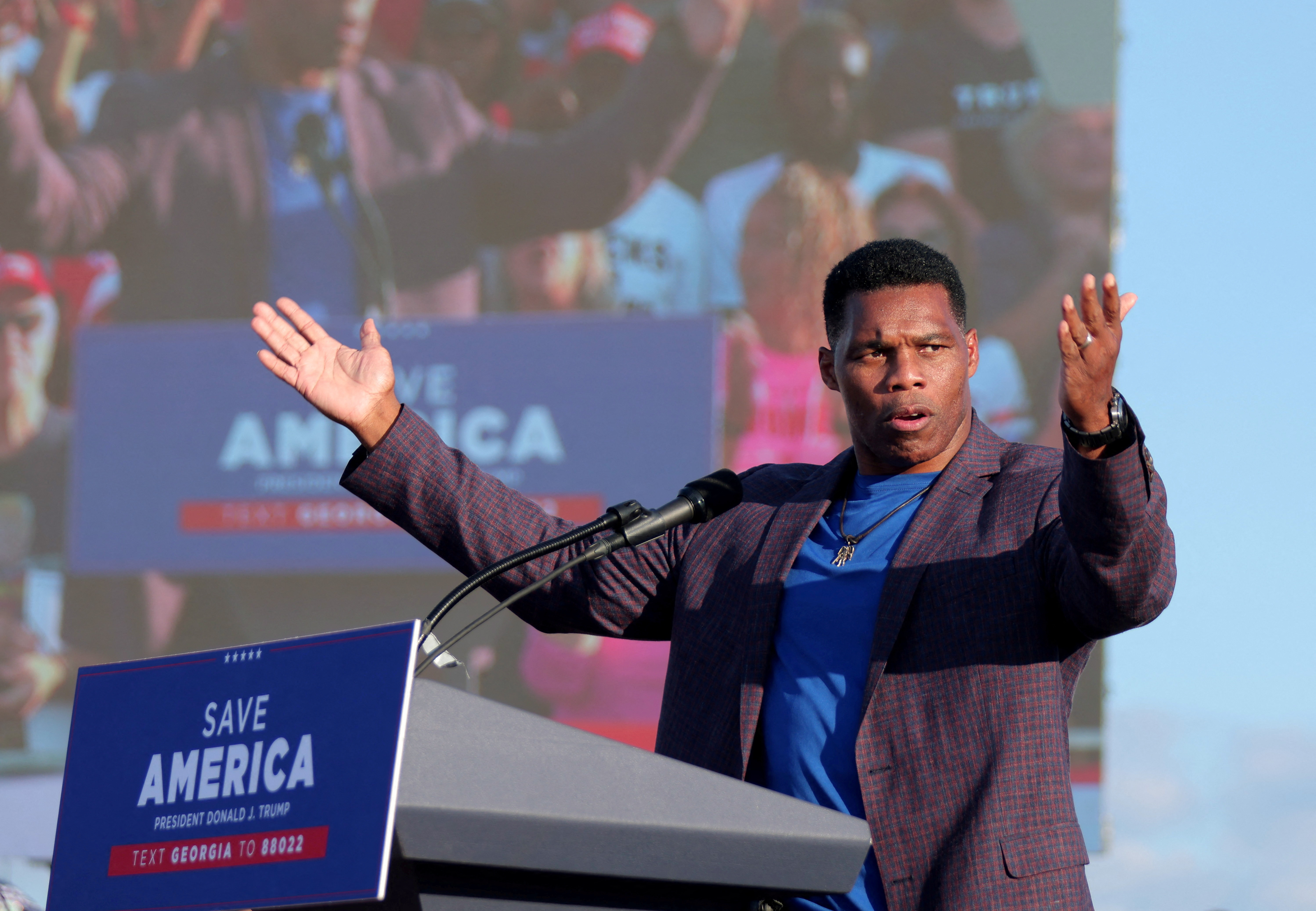 Former college football star and current senatorial candidate Herschel Walker speaks at a rally in Perry, Georgia, Sept. 25, 2021.
