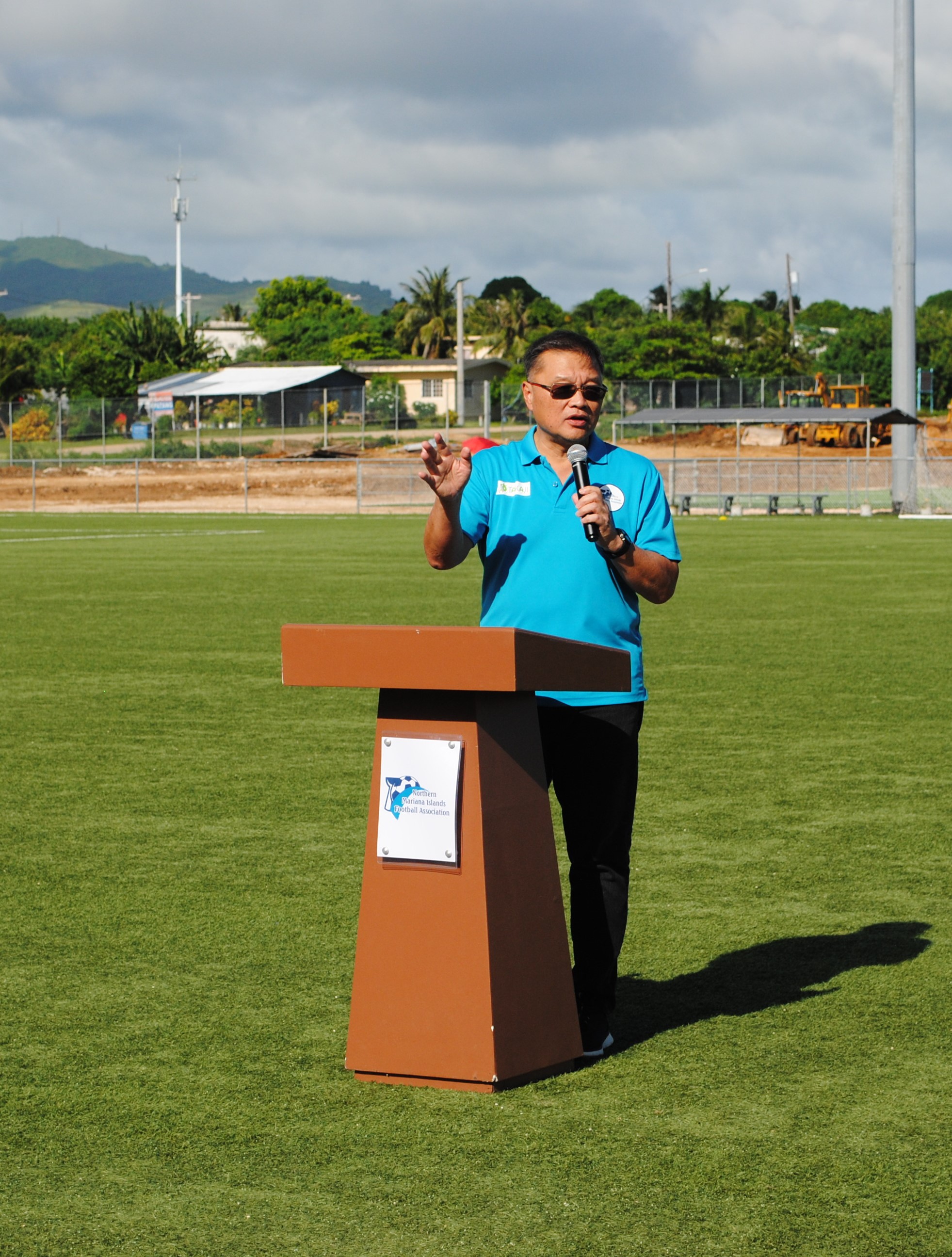 Northern Mariana Islands Football Association President Jerry Tan speaks during the inauguration of the NMI Soccer Training Center’s second regulation-size soccer pitch on Saturday.