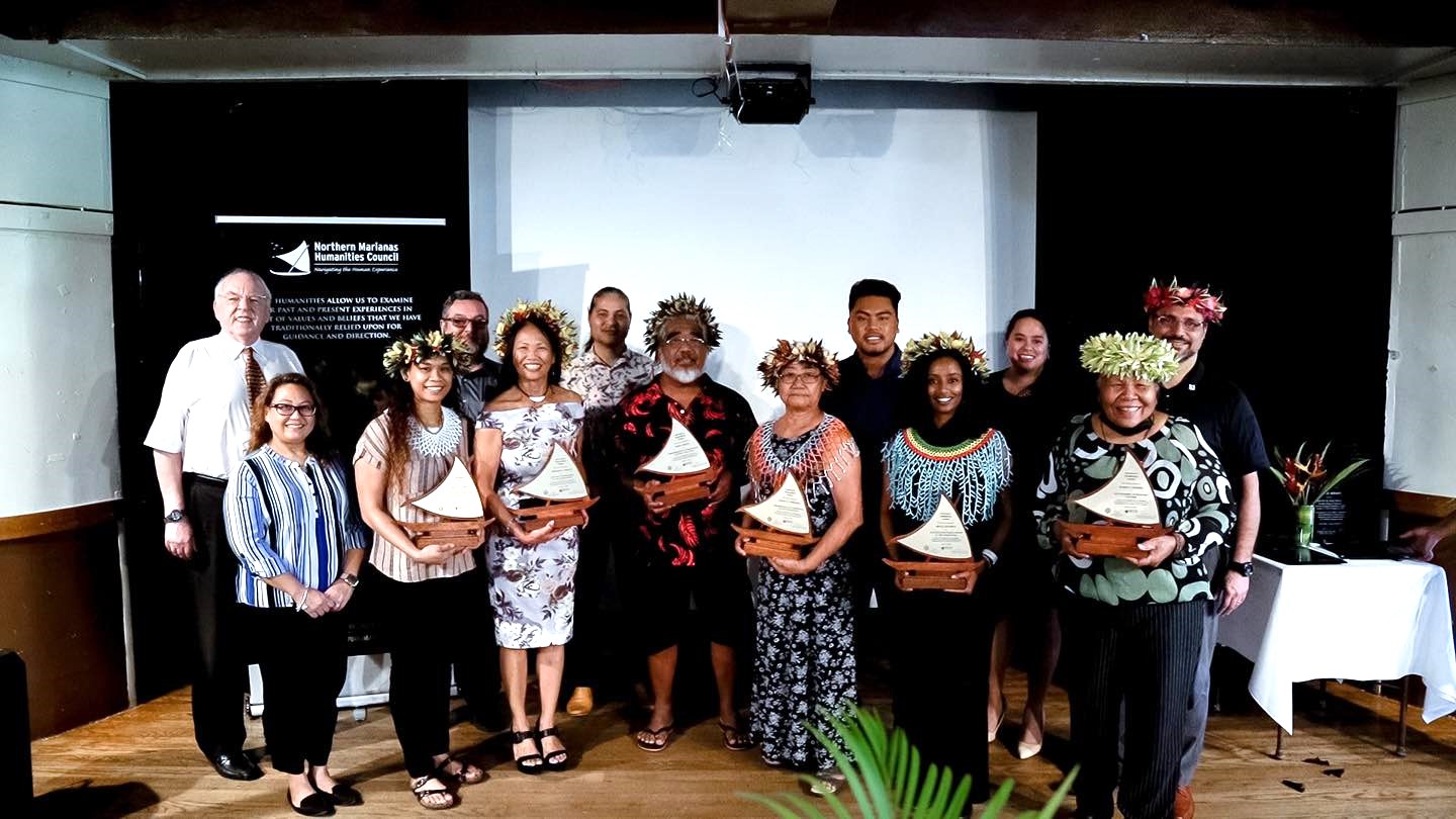 This year’s Governor’s Humanities awardees pose for a photo with the Northern Marianas Humanities Council officials at PIC-Charley’s Cabaret on Oct. 12, 2022.