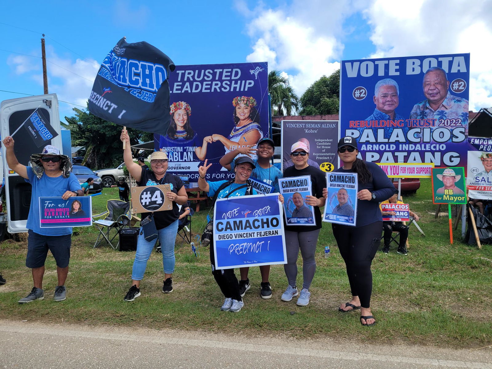 Supporters of Precinct 1 House candidate Diego Vincent Camacho in Dandan on Tuesday.
