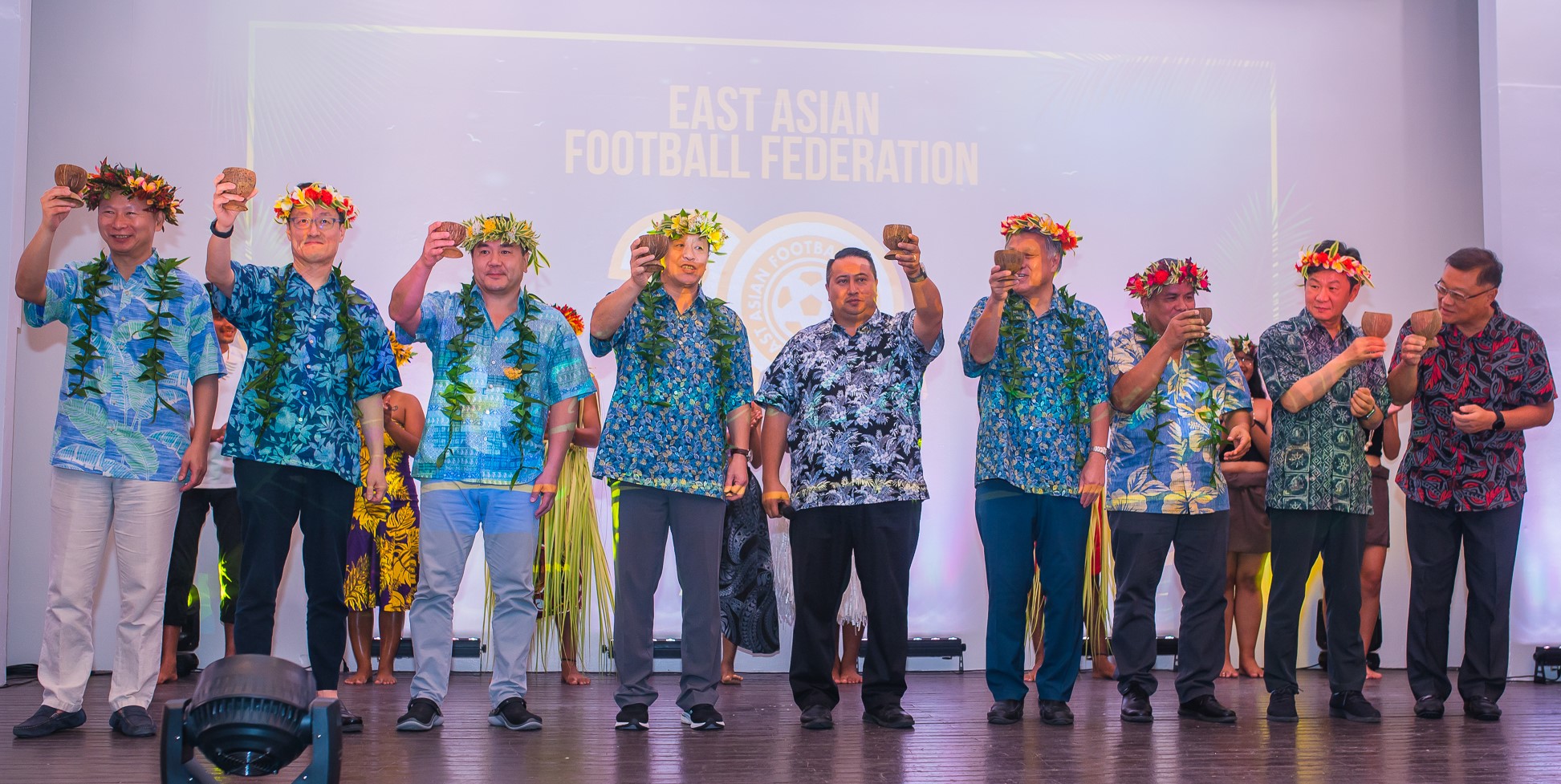 Gov. Ralph DLG Torres, center, proposes a toast to celebrate the East Asian Football Federation’s 20th Anniversary with, from left, Chinese-Taipei Football Association’s Chris Wang, EAFF Vice President Hanjin Chun, Mongolian Football Federation President Ganbaatar Amgalanbaatar, EAFF President  Du Zhaocai, EAFF Vice President Kozho Tashima, Guam Football Association President Valentino San Gil, Korean Football Association President Chung Mong-gyu, and NMIFA President Jerry Tan at the Crowne Plaza Resort Saipan on Friday.