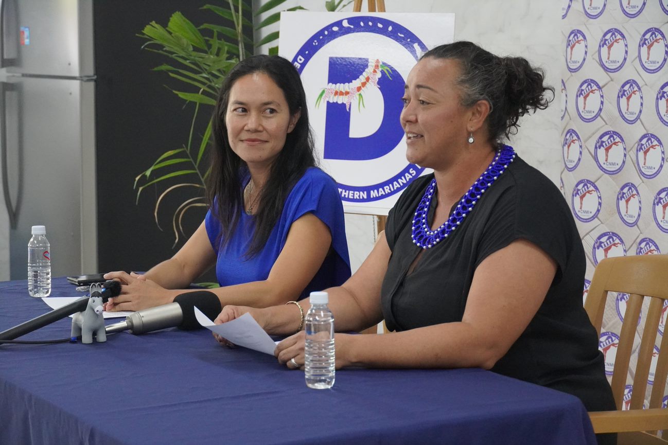 Democratic gubernatorial candidate Rep. Tina Sablan, left, smiles as her running mate, Rep. Leila Staffler, speaks during a press conference on Wednesday afternoon.