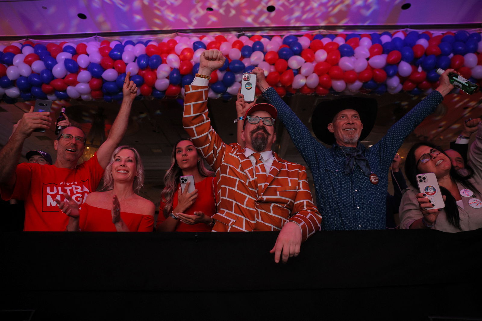Supporters wait for results at the Republican Party of Arizona's 2022 midterm elections night rally in Scottsdale, Arizona, Nov. 8, 2022.