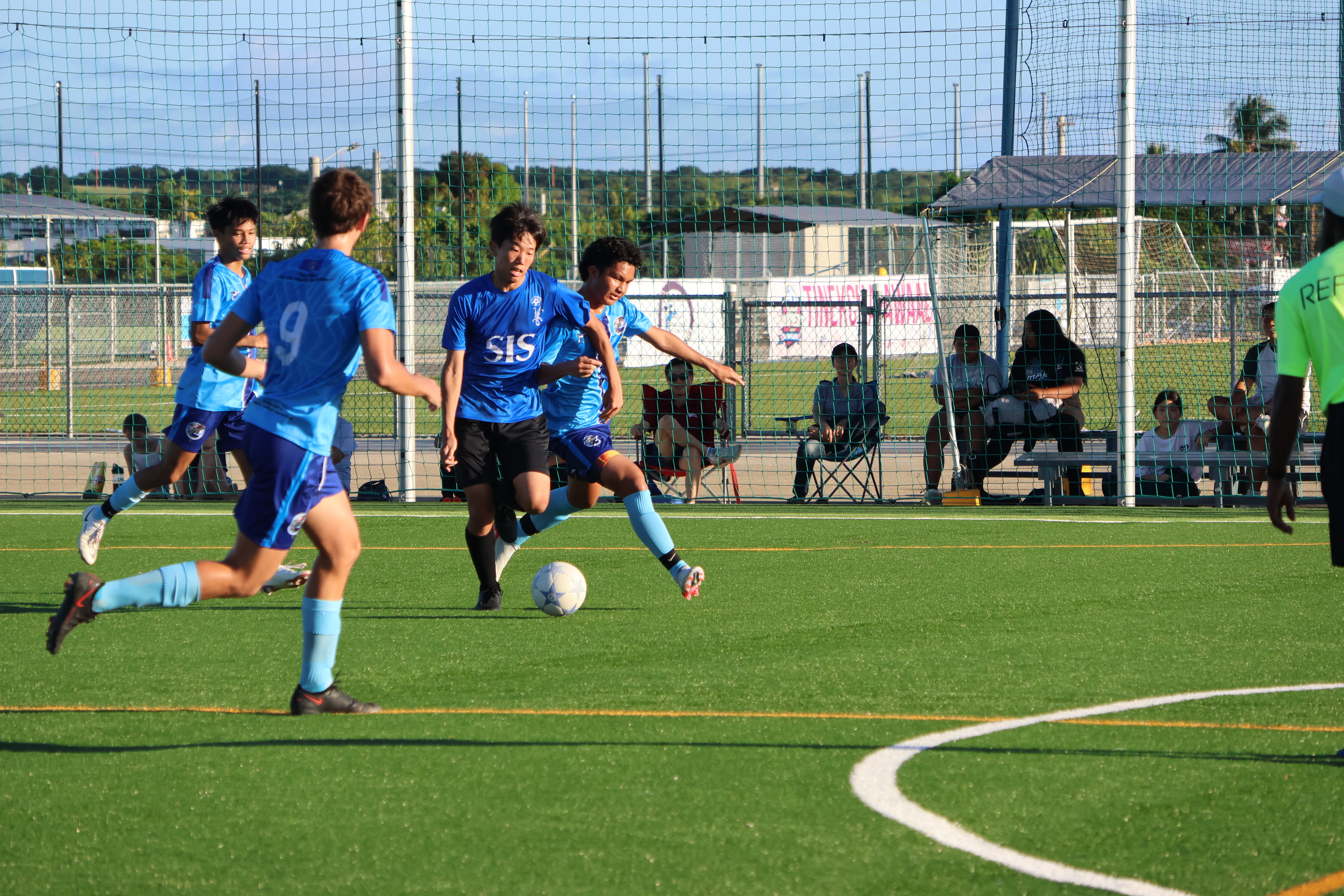 An MHS player tries to intercept  SIS’ ball during a boys high school division game of the NMIFA-PSS Interscholastic Soccer League Tuesday at the NMI Soccer Training Center.