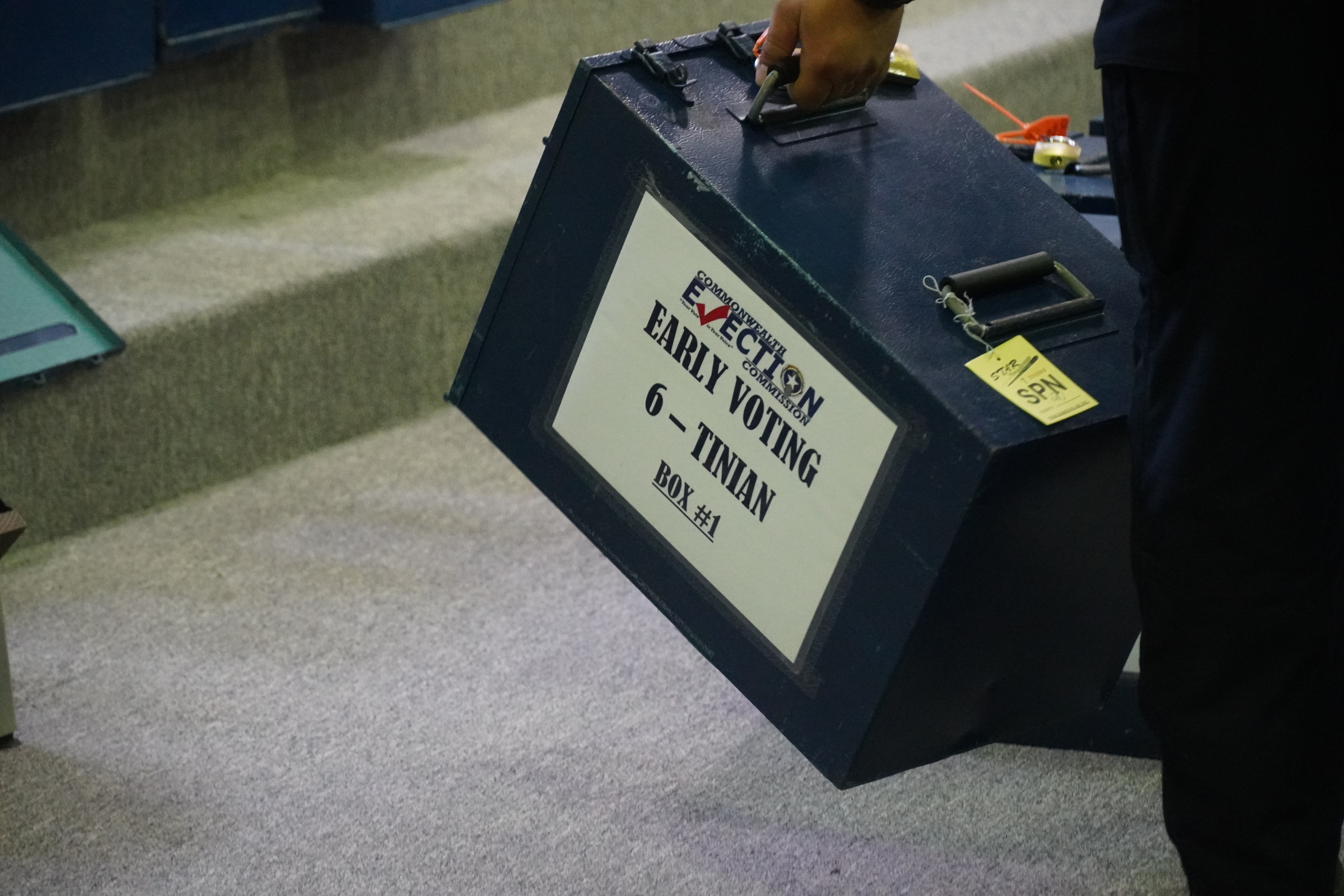 A Tinian ballot box arrives at the multi-purpose center in Susupe on election night.