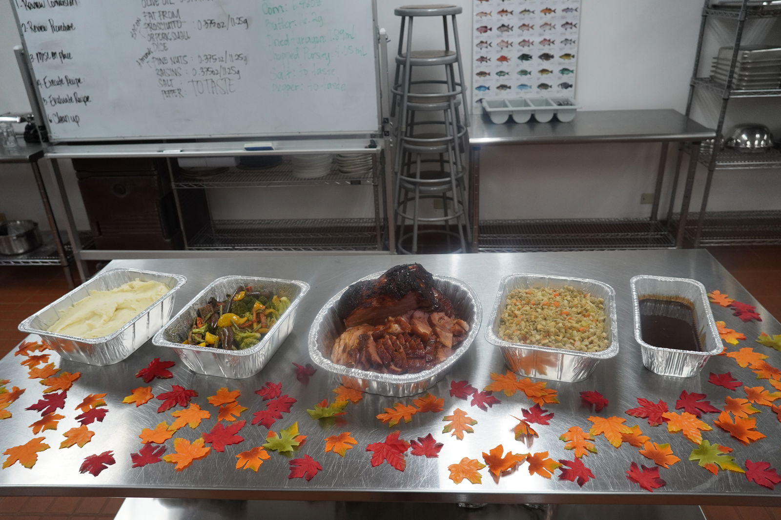 The Thanksgiving meal prepared by Northern Marianas Technical Institute culinary arts students and their instructor is complete with mashed potatoes, vegetables, ham, stuffing, and gravy.