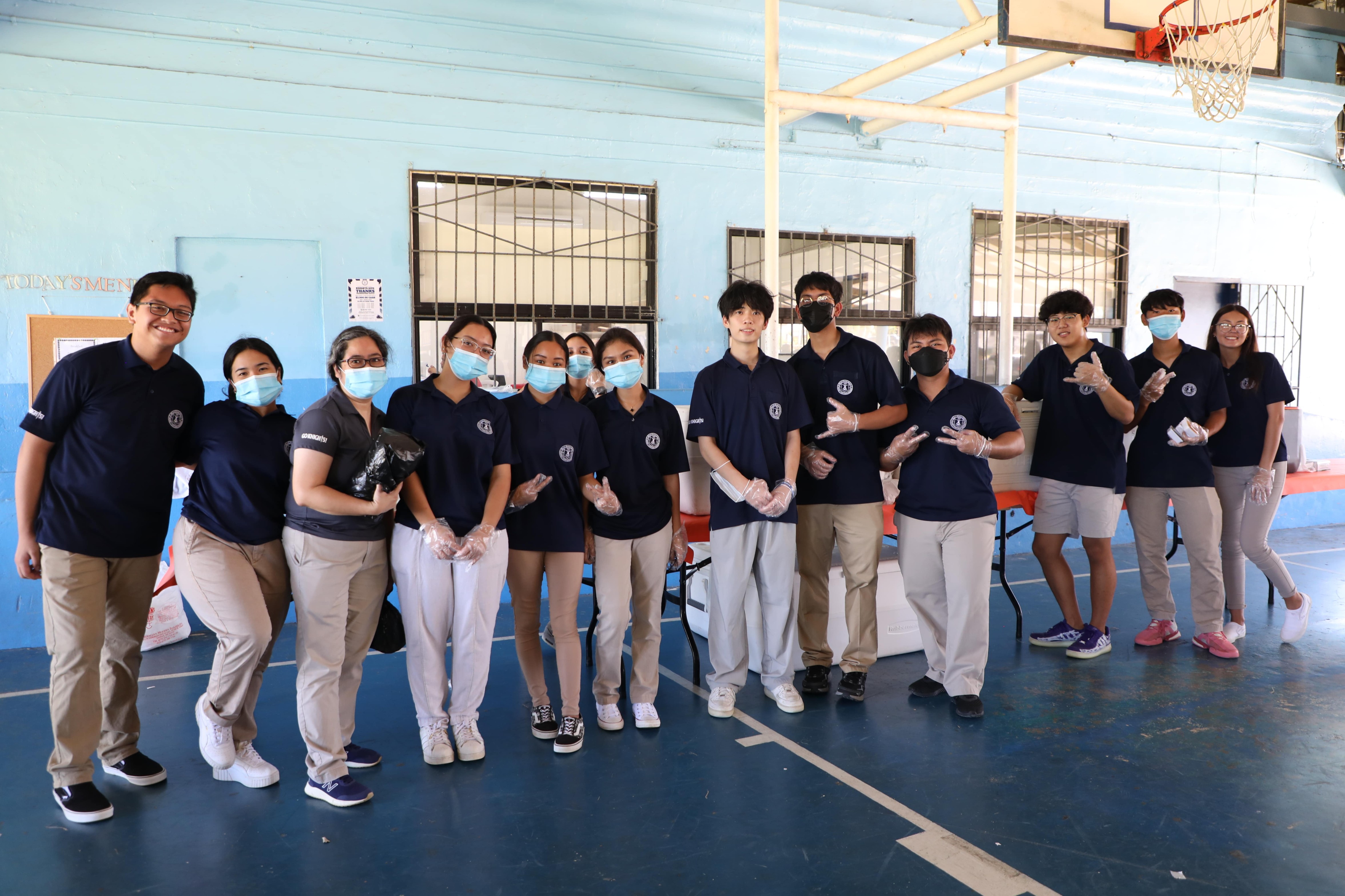 As part of the school's tradition, Mount Carmel School's seniors distributed food for its student body during the annual Thanksgiving Fiesta.