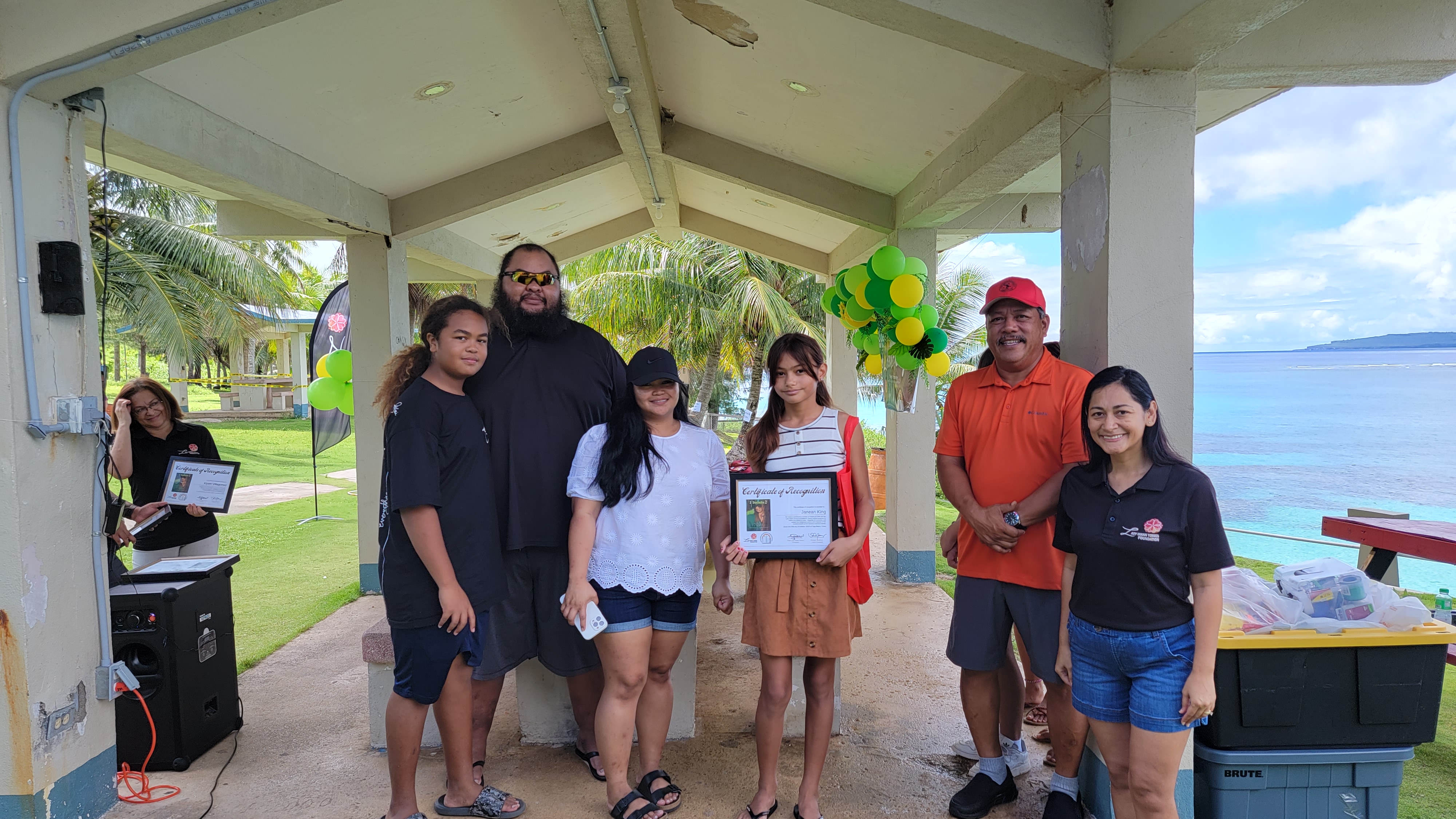 I Duendis 2 author Jenean King receives her certificate of recognition from first lady Diann Torres. Also in photo are Tinian Mayor Edwin Aldan and family members.