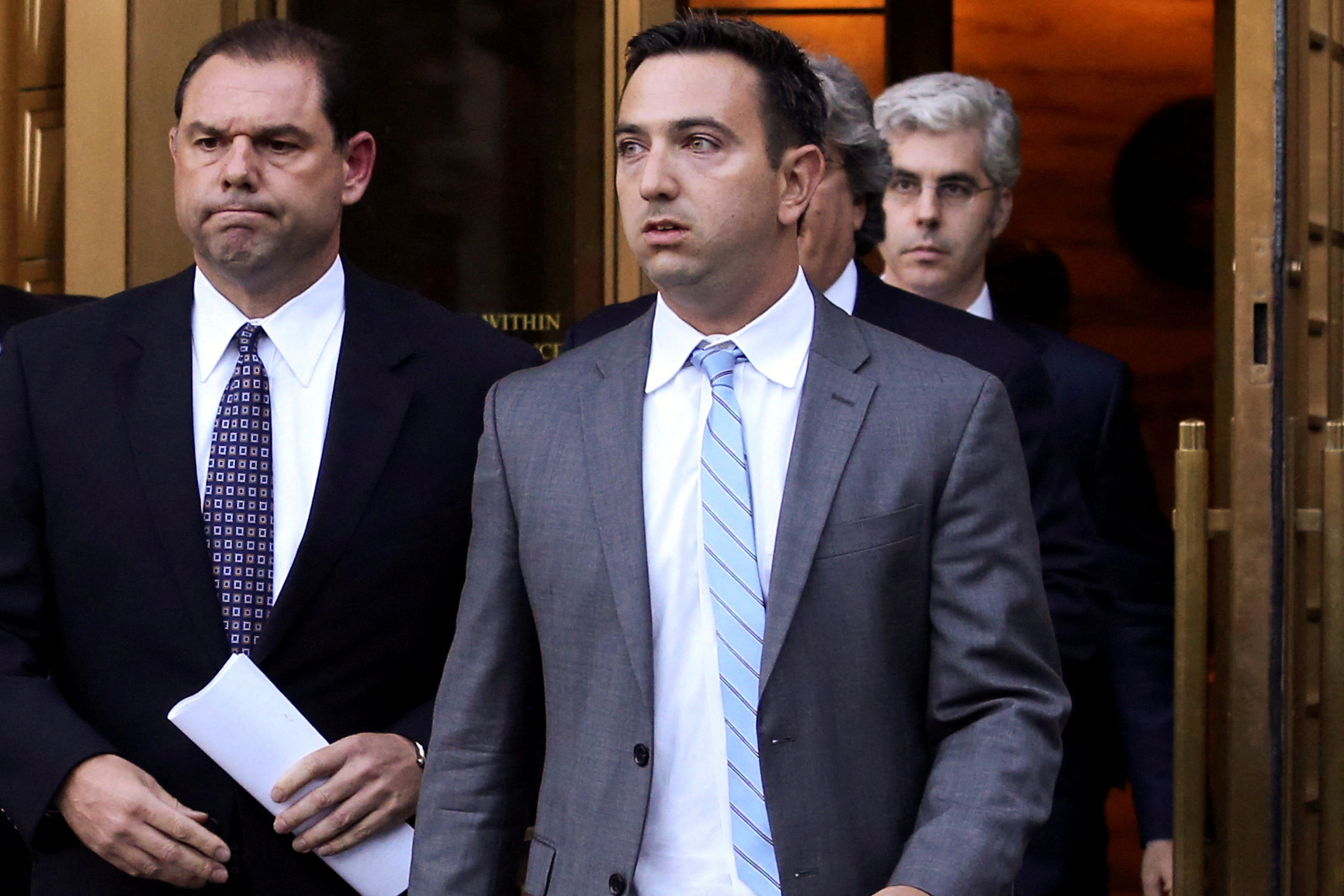 Joseph Percoco, left, former aid to New York Governor Andrew M. Cuomo, walks out of the Manhattan Federal Courthouse in New York, Sept. 22, 2016.