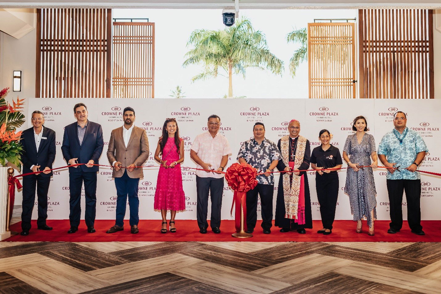 From left, Robert Coates, general manager Crowne Plaza Resort Saipan; Thomas Mayrhofer, regional general manager Crowne Plaza Resort Guam and Saipan; Abhijay Sandilya, managing director IHG Japan; Lydia Tan; Jerry Tan, president & CEO Tan Holdings; Gov. Ralph DLG Torres; Bishop Ryan Jimenez; first lady Diann Torres; Jennifer Tan, director S.A.I leisure; and Speaker Edmund Villagomez.