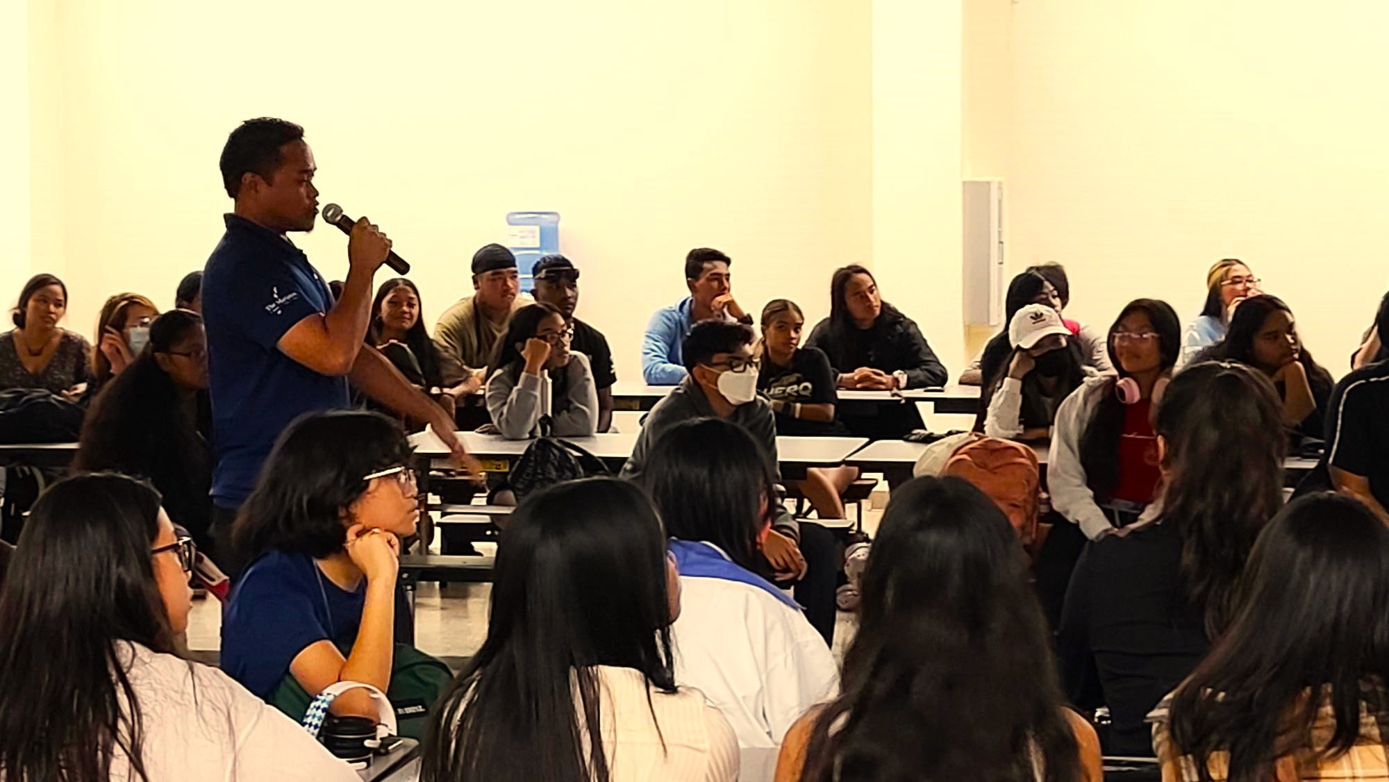 10th graders at Marianas High School in Saipan learn about the programs of the Marianas Visitors Authority from MVA Community Projects Specialist Jack Aranda on Nov. 21, 2022, as part of the annual school presentation of MVA and the Marianas Tourism Education Council.