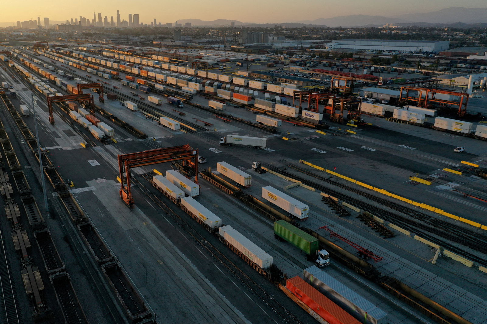 An aerial view of gantry cranes, shipping containers, and freight railway trains ahead of a possible strike if there is no deal with the rail worker unions, at the Union Pacific Los Angeles  Intermodal Facility rail yard in Commerce, California, Sept. 15, 2022.