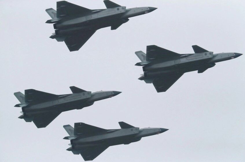 J-20 stealth fighter jets of the Chinese People's Liberation Army  Air Force perform in formation at the China International Aviation and Aerospace Exhibition, or Airshow China, in Zhuhai, Guangdong province, China, Nov. 8, 2022.