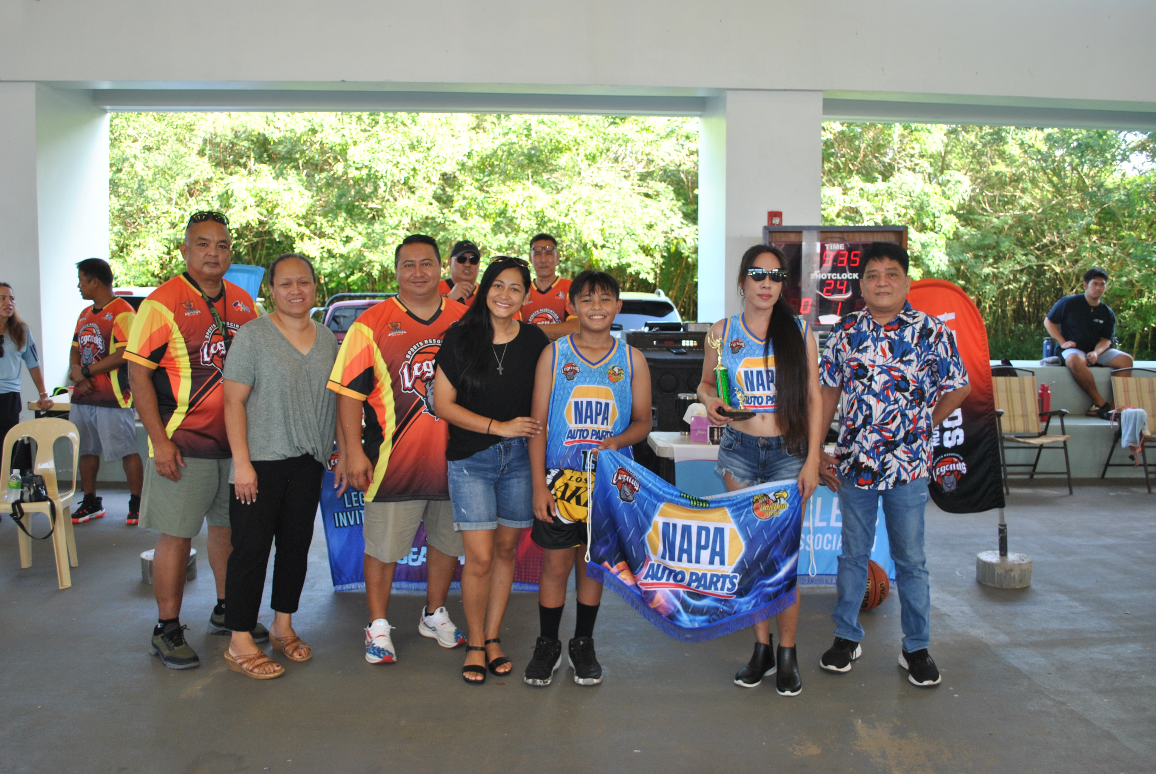 NAPA's muse, Venus Grenio, poses with Gov. Ralph DLG Torres and first lady Diann T. Torres after receiving the Best Muse Award in the open division.