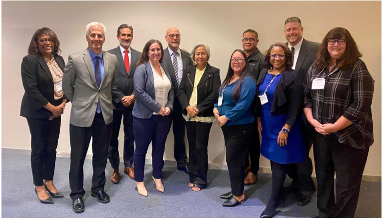 Back row, from left: Nancy Taylor, USDOL ETA, director, Special Initiatives and Demonstrations; Nick Lalpuis, US DOL ETA, San Francisco regional administrator; Frank Stluka, USDOL ETA, director, Workforce Investment; Eugene Tebuteb, CNMI DOL, director, Employment Services; Bob Kenyon, USDOL ETA, director, Unemployment Insurance. Front row, from left: Steve Malliaras, USDOL ETA, manager, Division of Workforce Security; Annie Leonetti, USDOL ETA, deputy administrator; Vicky Benavente, CNMI secretary of Labor; Frances Torres, CNMI DOL, director, Workforce Investment Agency; Lorraine Jamison, USDOL ETA, manager, Division of Financial Management and Administrative Services; and Karen Connor, DOL ETA, manager, Division of Workforce Investment.