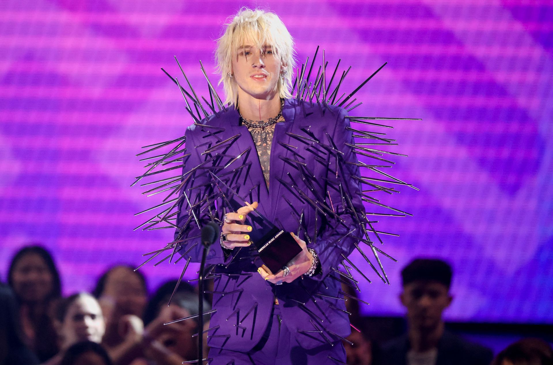 Machine Gun Kelly receives the Favorite Rock Artist award during 2022 American Music Awards, at the Microsoft Theater in Los Angeles, California, Nov. 20, 2022.