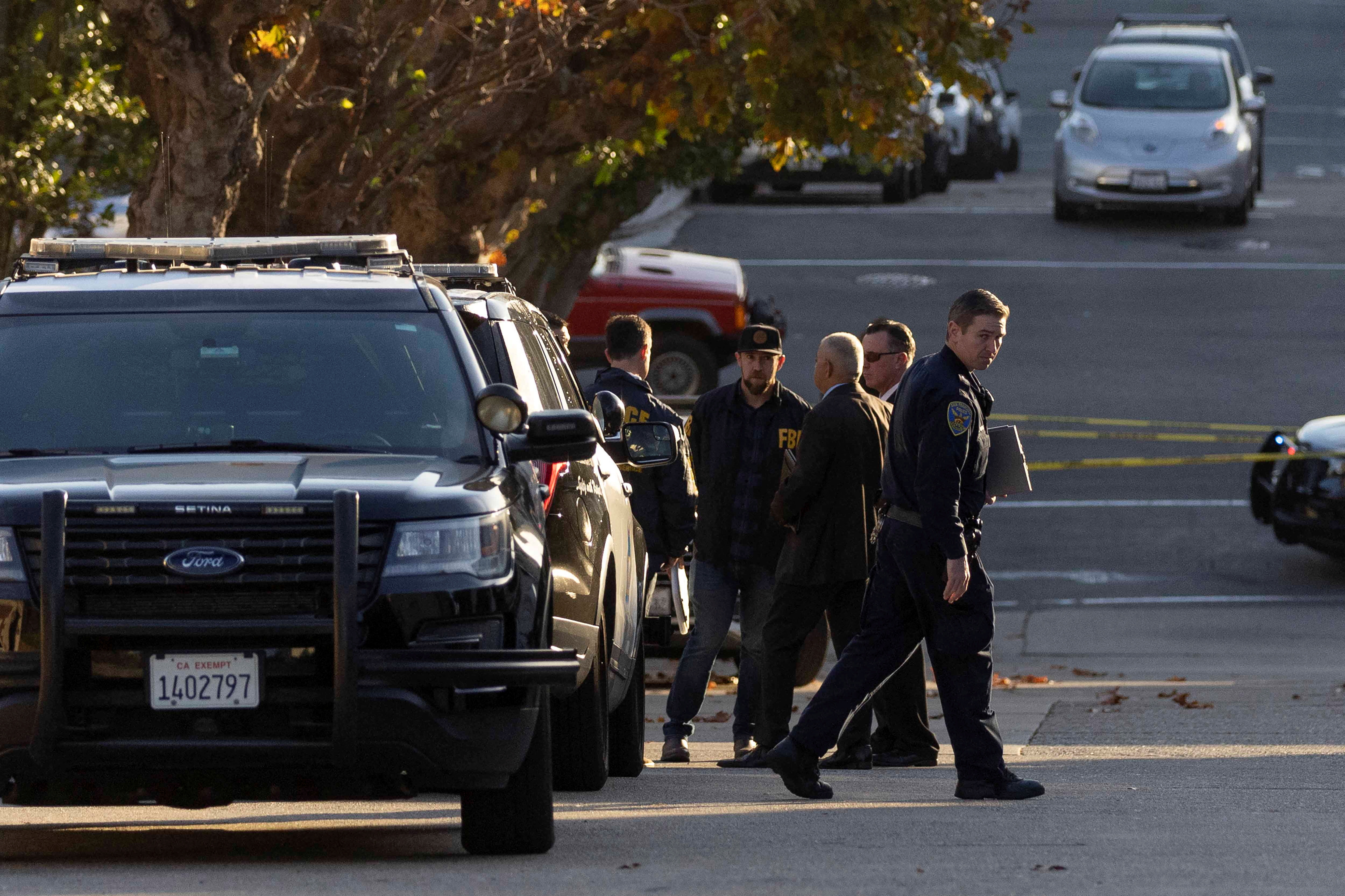 Members of law enforcement work outside the home of U.S. House Speaker Nancy Pelosi where her husband Paul Pelosi was violently assaulted after a break-in at their house, according to a statement from her office, in San Francisco, California, Oct. 28, 2022.