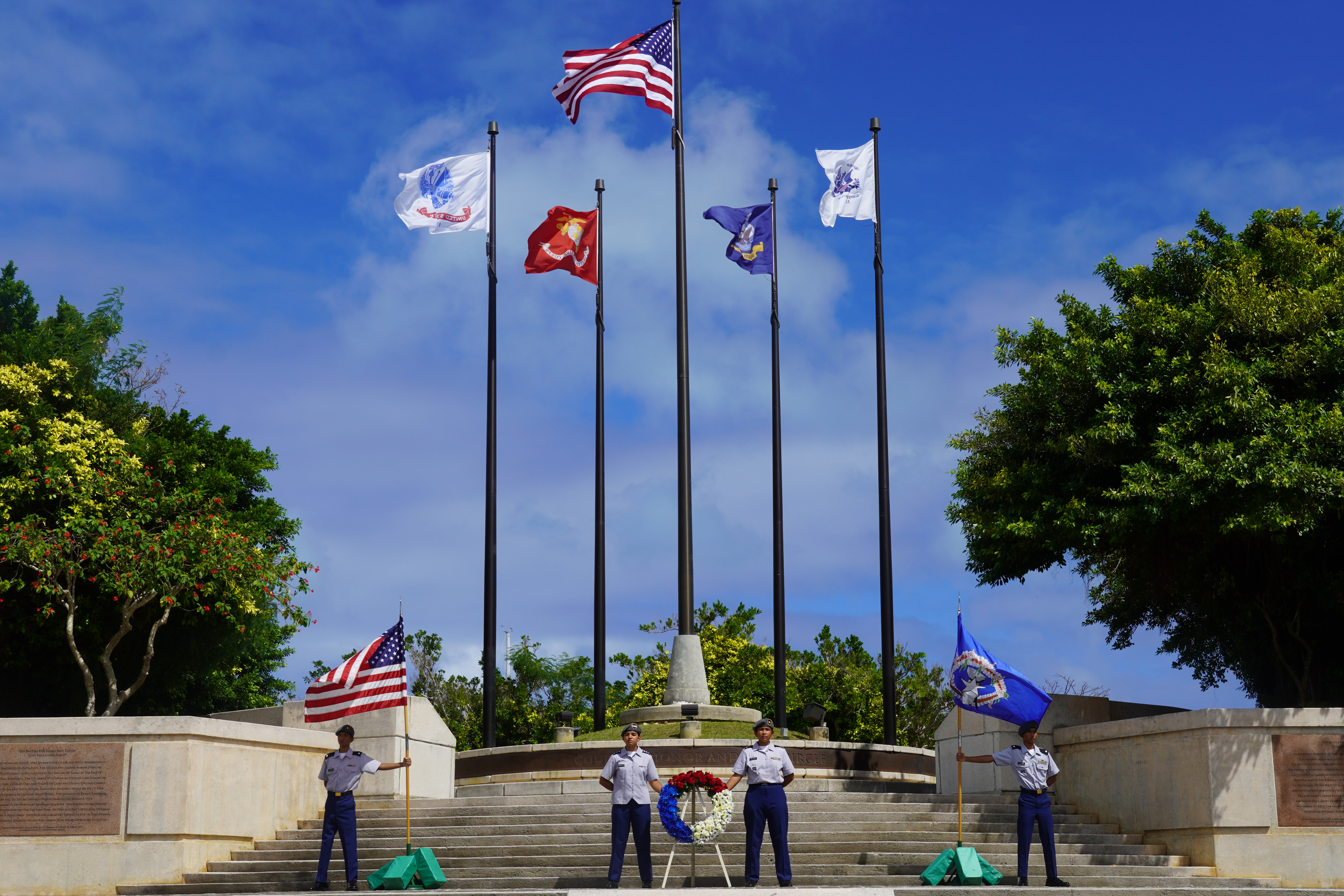Saipan Southern High School Manta Ray Battalion cadets watch over the U.S. and CNMI flags, and the Veterans Day ceremonial wreath.