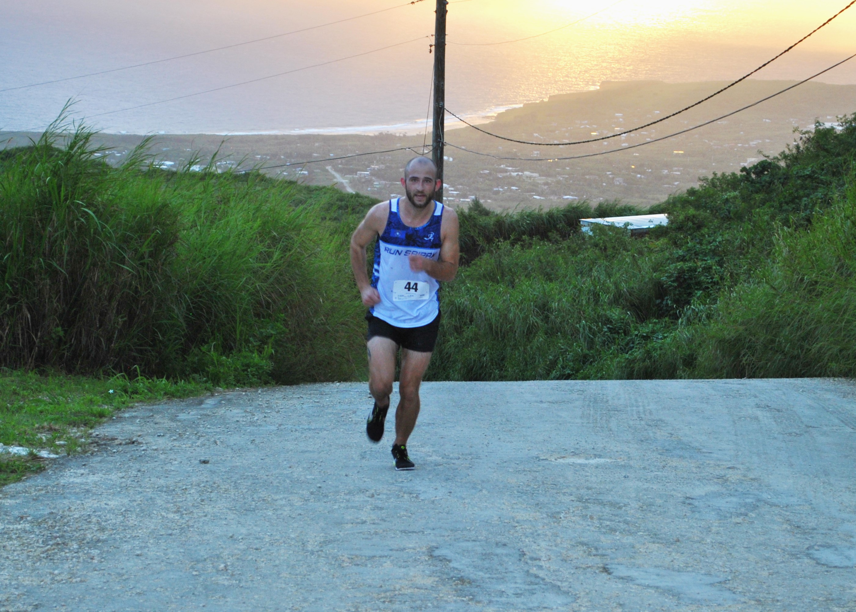 Keith Ketola pushes through the final leg of the NMA Mt. Tapochao Turkey Trot 2022.