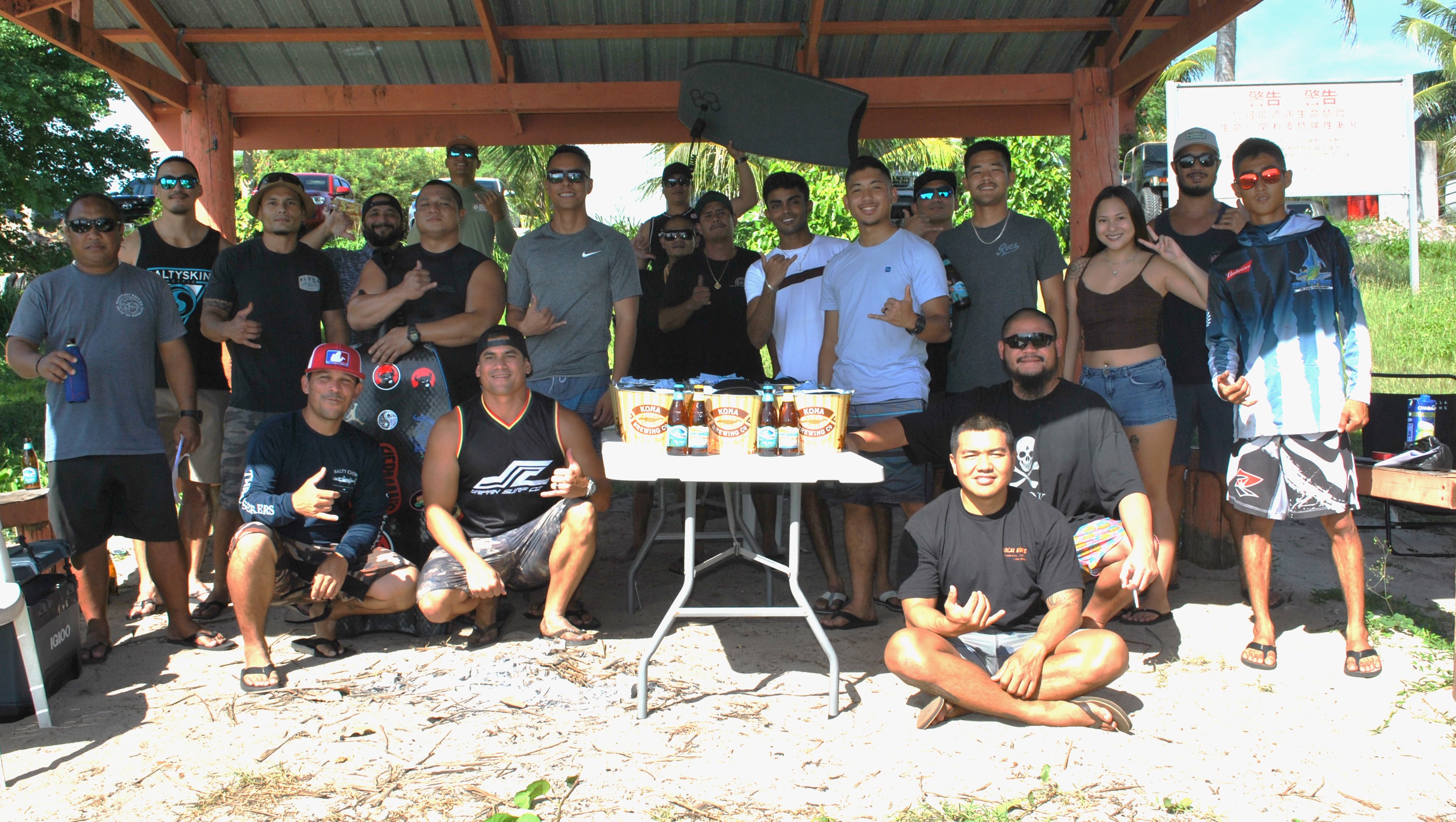 The participants and competition director Ed Manibusan pose for a photo during a meeting Saturday to discuss “Boogie Down at Obyan” which will be held on Dec. 10 and 11 at Obyan Beach.