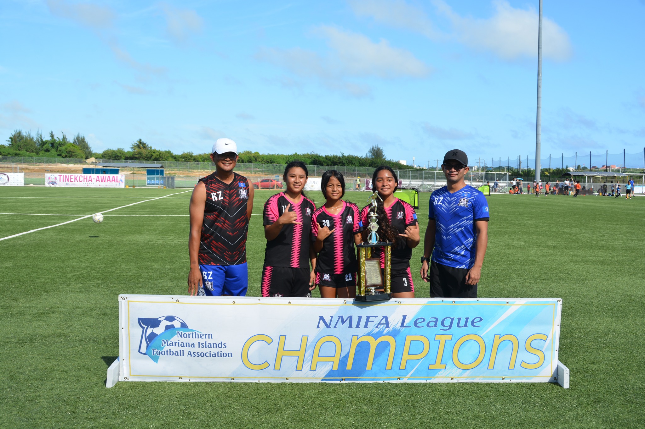 Southern United players pose with their championship trophy after winning the U13 girls division title of the TakeCare Youth Soccer League on Saturday at the NMI Soccer Training Center.