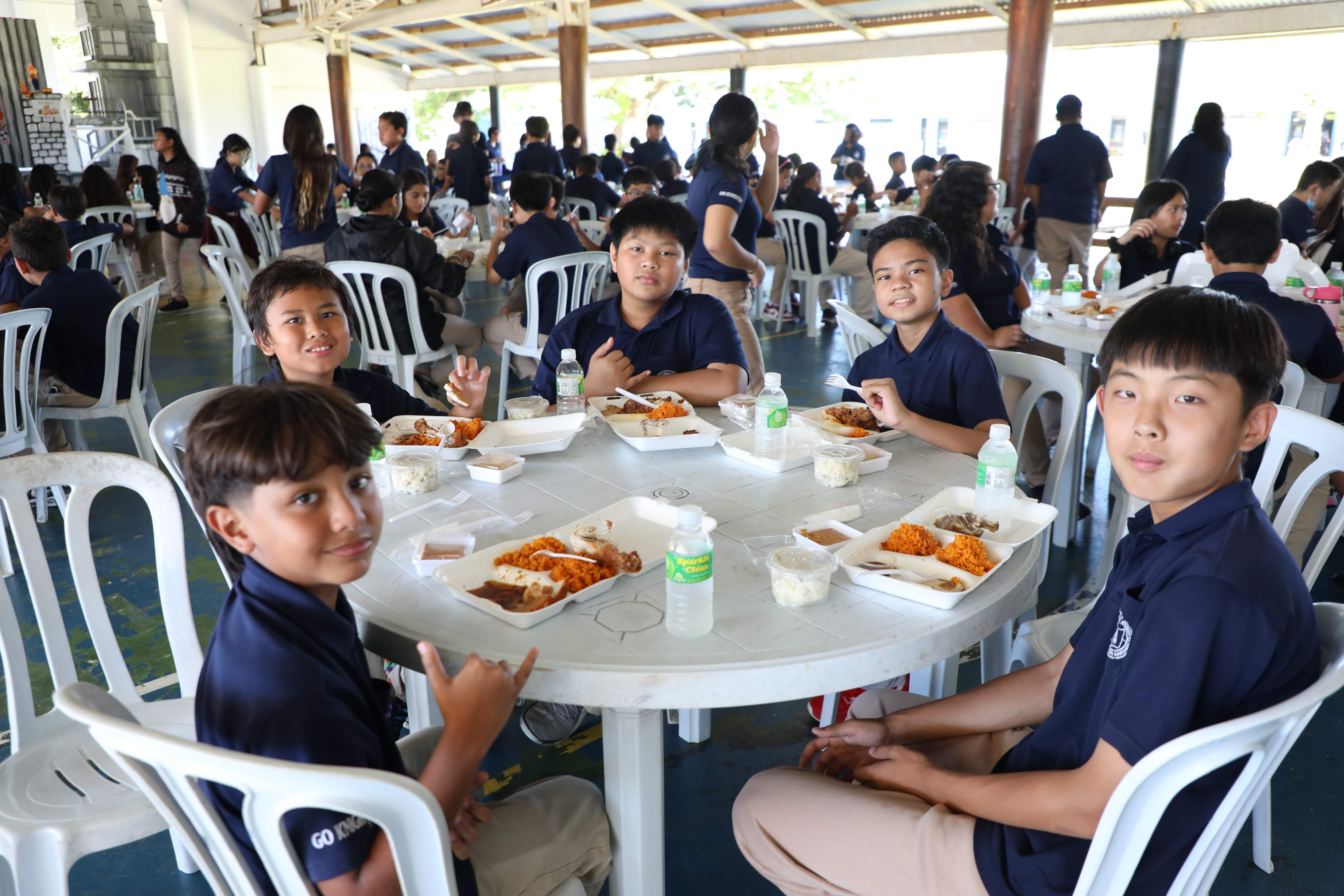 Mount Carmel School students gathered together for a Thanksgiving meal during the annual Thanksgiving Fiesta in the school cafeteria.