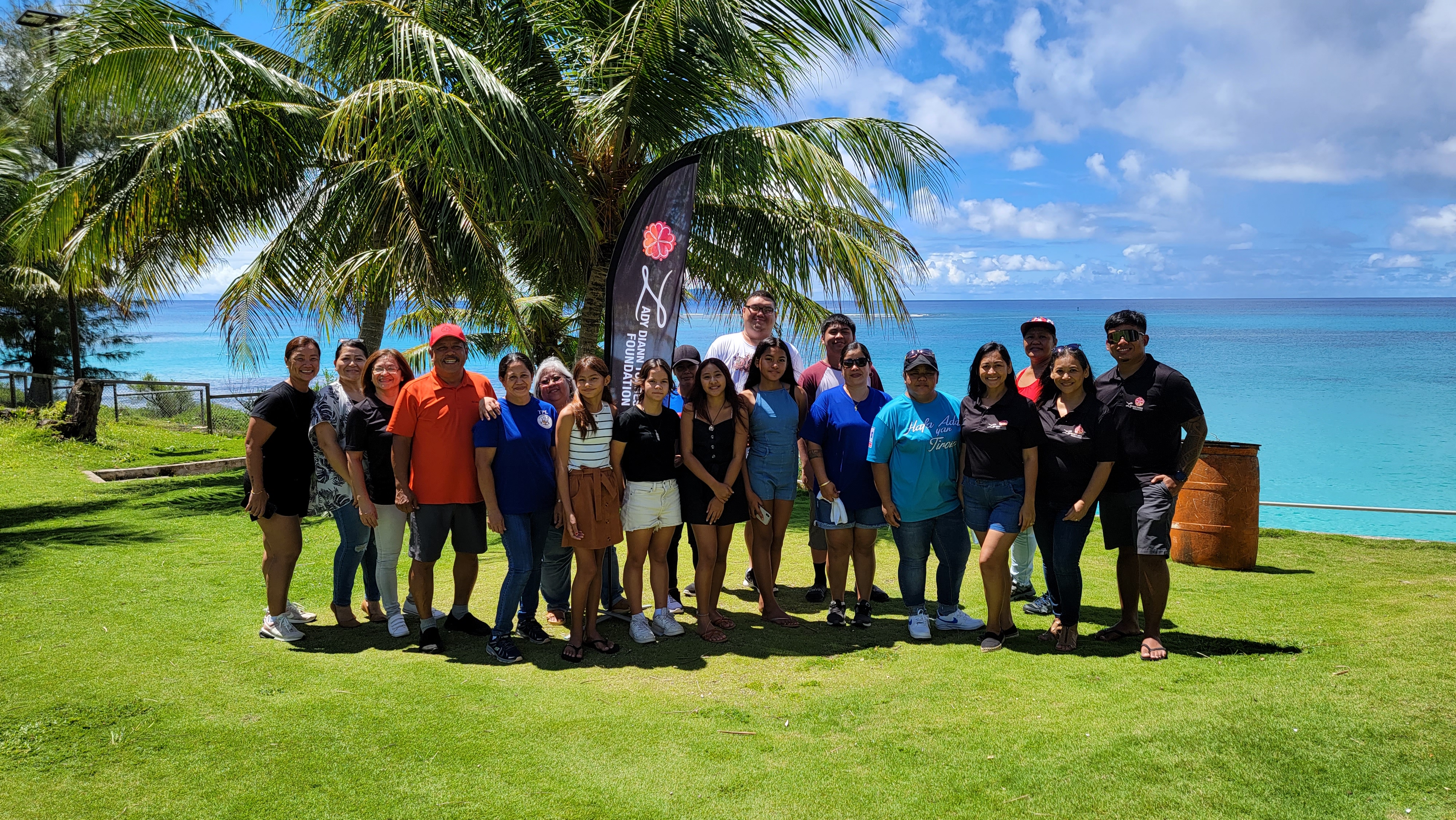 I Duendis 2 authors pose with first lady Diann, Mayor Aldan and volunteers from the Lady Diann Torres Foundation and the Tinian Mayor's Office.