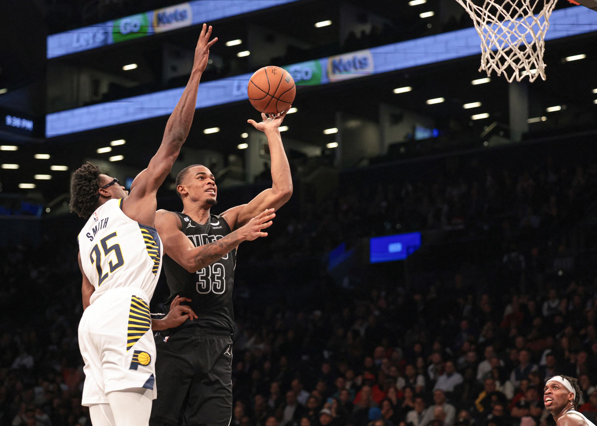 Brooklyn Nets forward Nic Claxton (33) shoots the ball as Indiana Pacers forward Jalen Smith (25) defends during the second half at Barclays Center in Brooklyn, New York, Oct. 31, 2022.