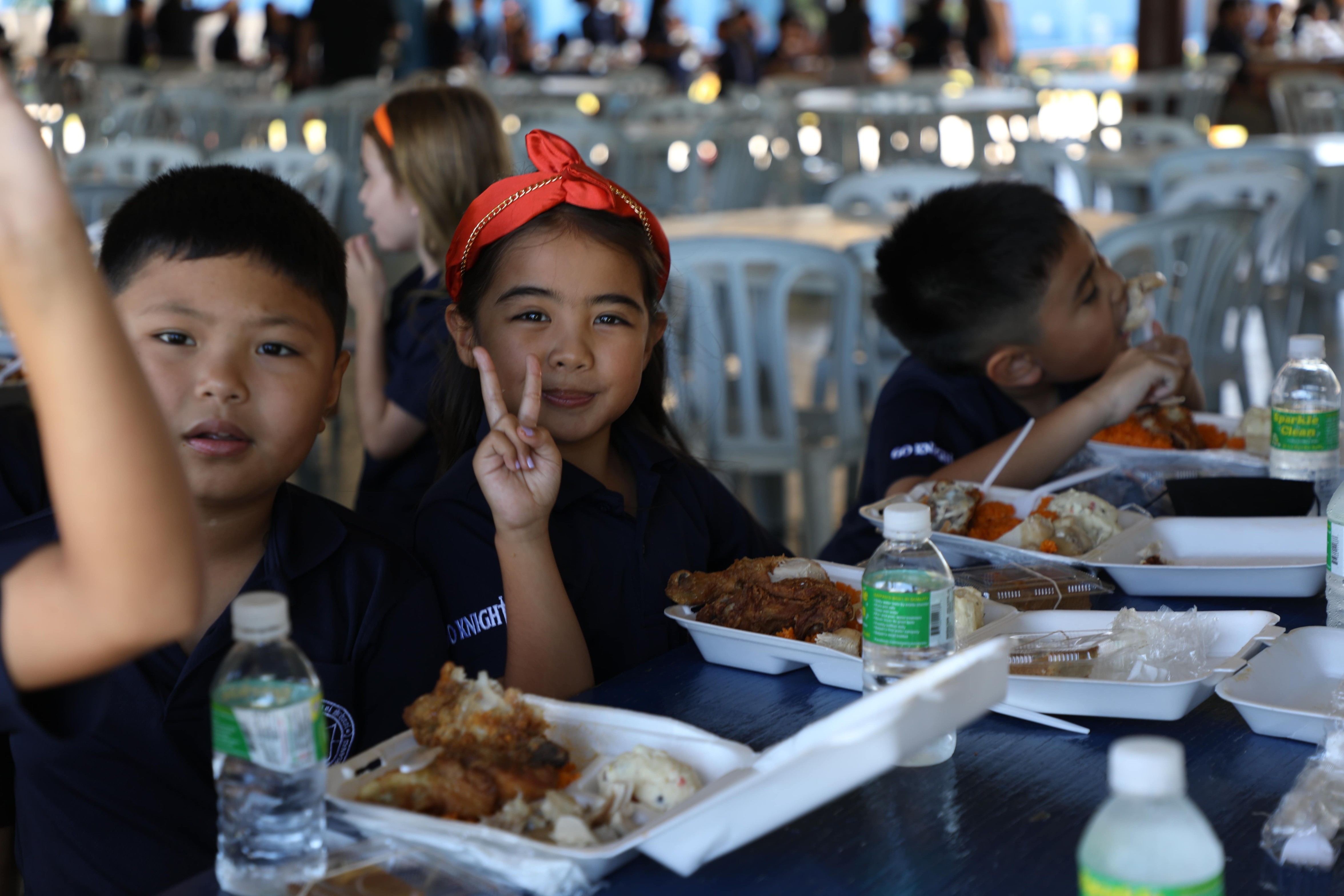 Mount Carmel School students gathered together for a Thanksgiving meal during the annual Thanksgiving Fiesta in the school cafeteria.