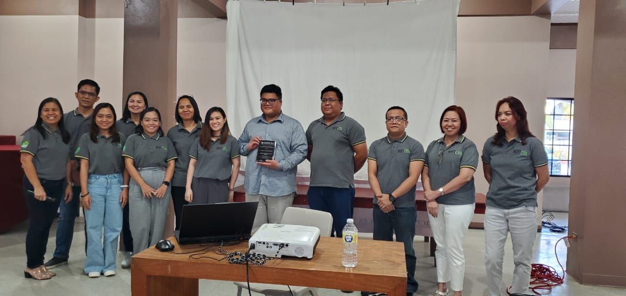 MIFICPA officers recognize the training's guest speaker, Elijah Cabautan, CFE, center.