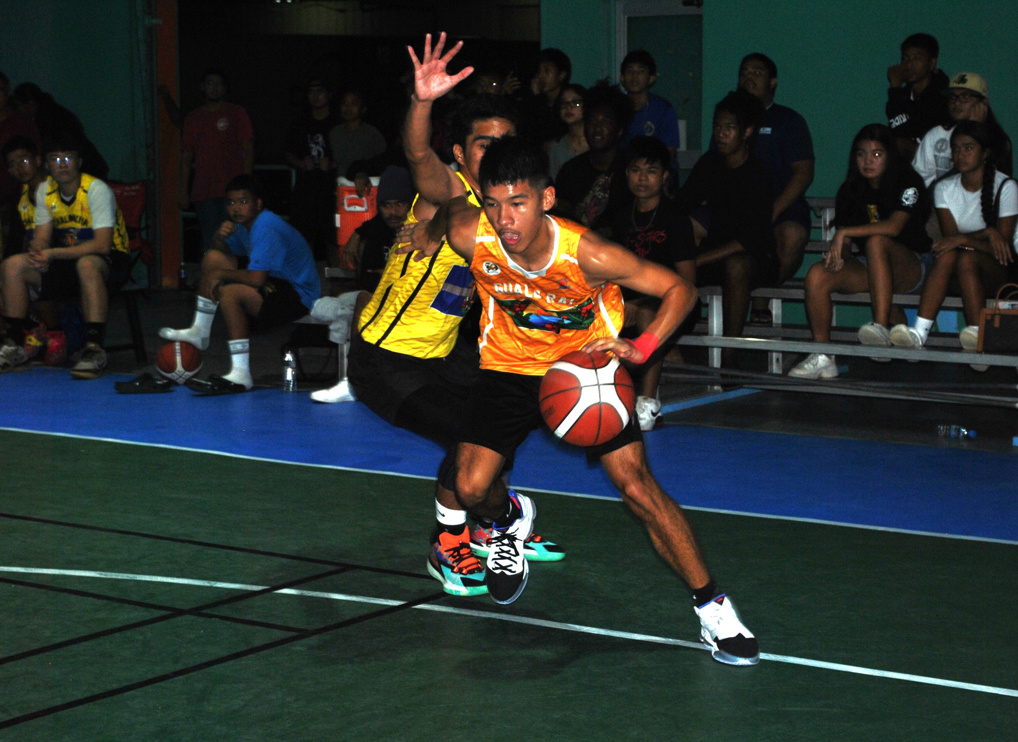 Gualo Rai's Leopoldo Naraja drives toward the hoop during a U18 boys division game of the 2022 Marianas Village Pride Basketball League at the TSL Sports Complex on Saturday.