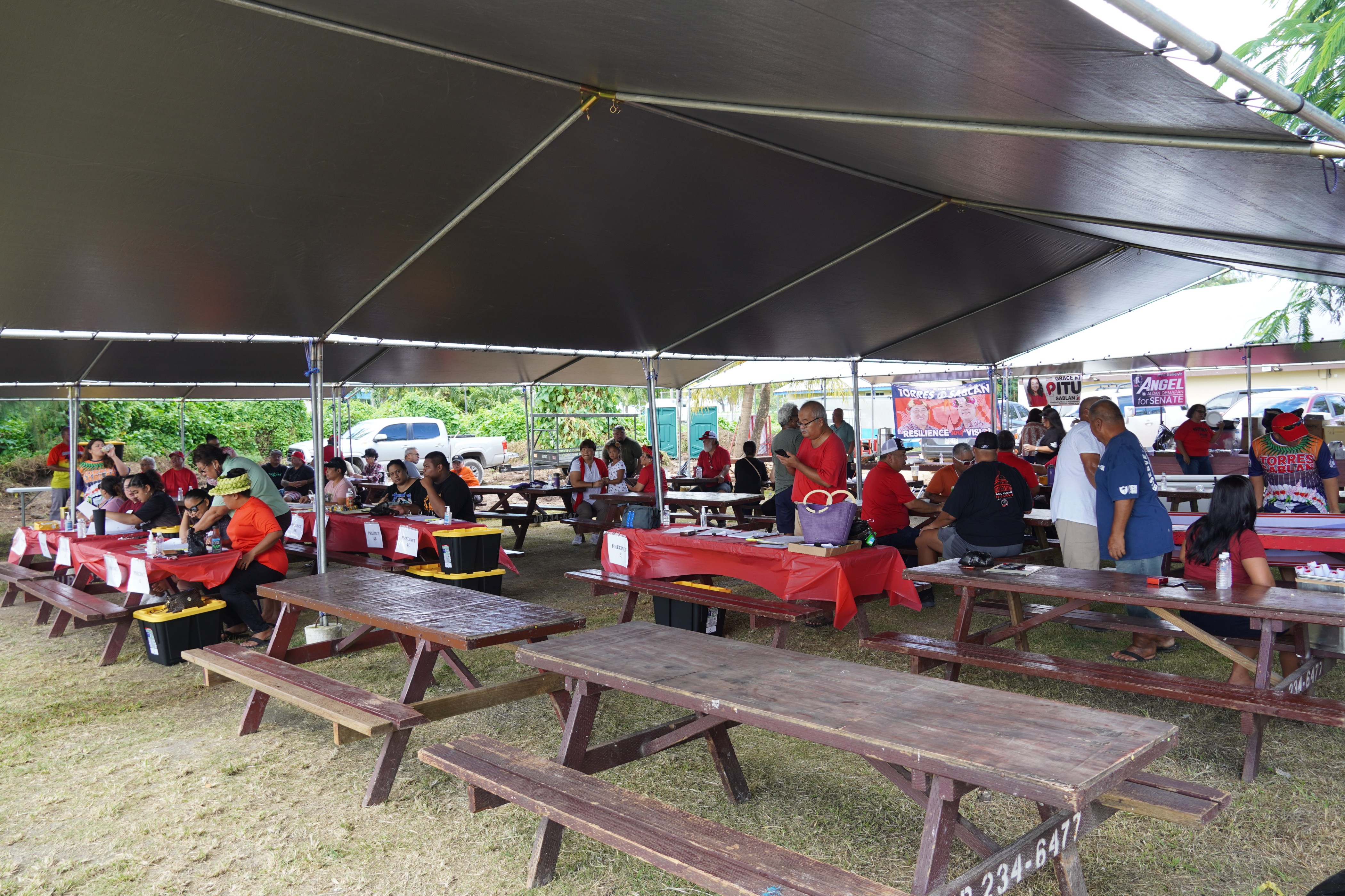 Republican candidates, leaders and supporters are seen under their canopies.