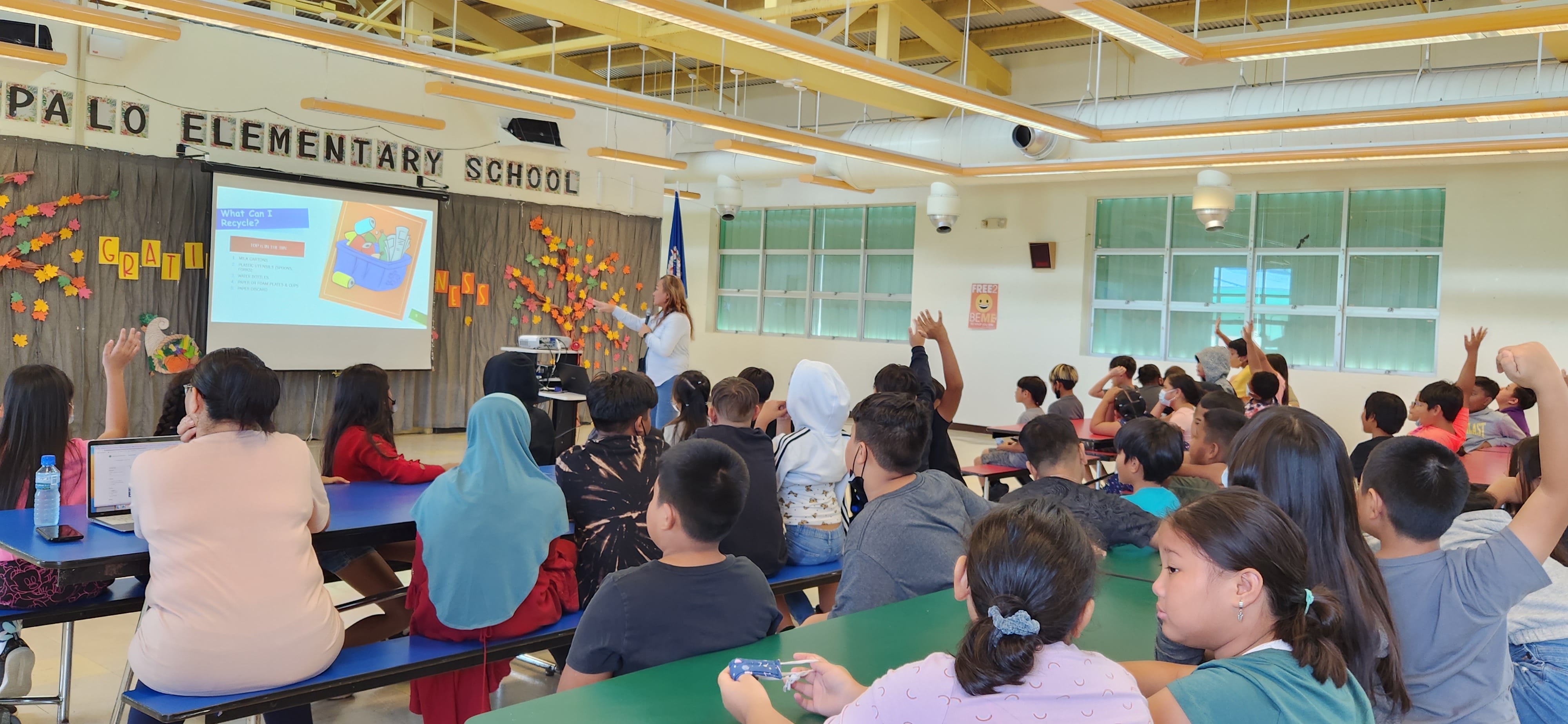 Office of Planning and Development Solid Waste Project Coordinator for Rota Noreen Sablan leads a presentation on the benefits of recycling and what items can be recycled for the 4th, 5th, and 6th graders of Sinapalo Elementary School.