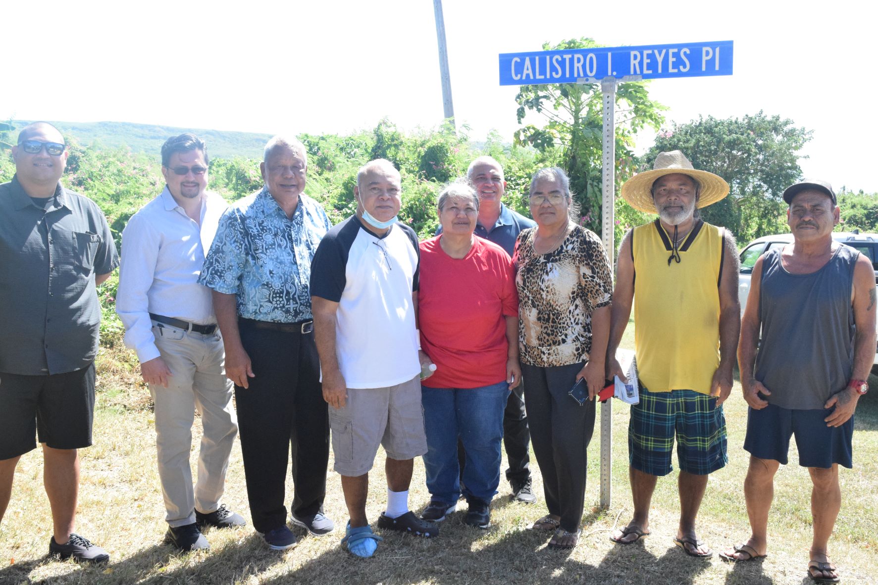 Calistro I. Reyes, fourth left, and his family pose for a photo with Saipan Mayor and Lt. Gov.-elect David M. Apatang, third left, Rep.-elect Vince Camacho, left, Rep. Edwin Propst, second left, and Rep. Joseph Flores, backrow.